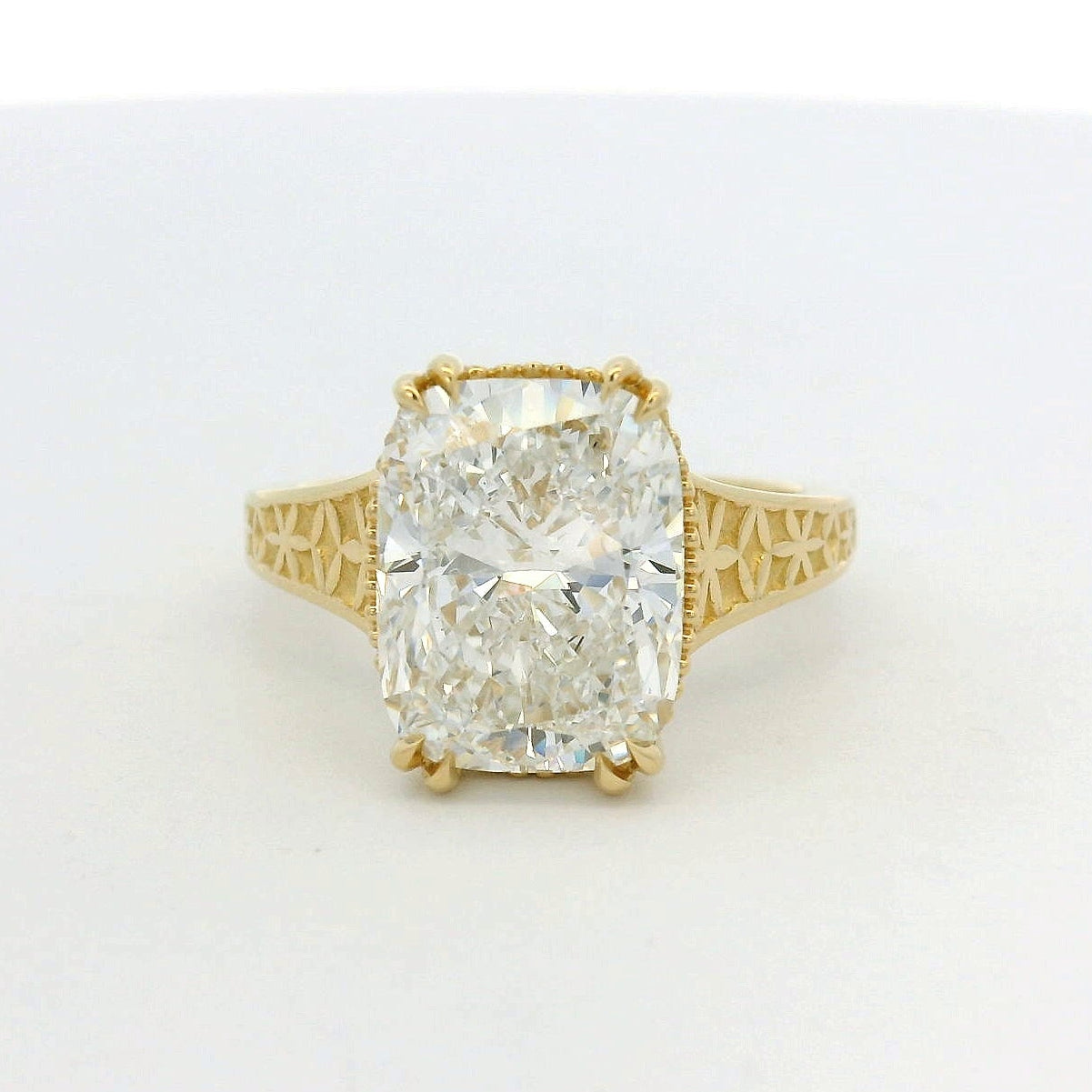 14KT yellow gold double prong detailed band 5.04ct elongated cushion LG diamond engagement ring