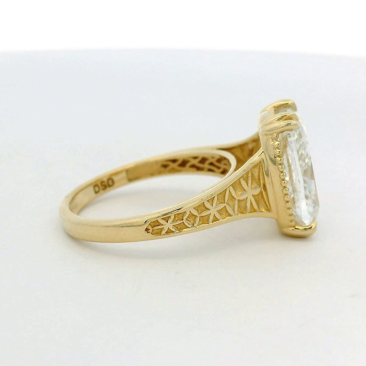 14KT yellow gold double prong detailed band 5.04ct elongated cushion LG diamond engagement ring
