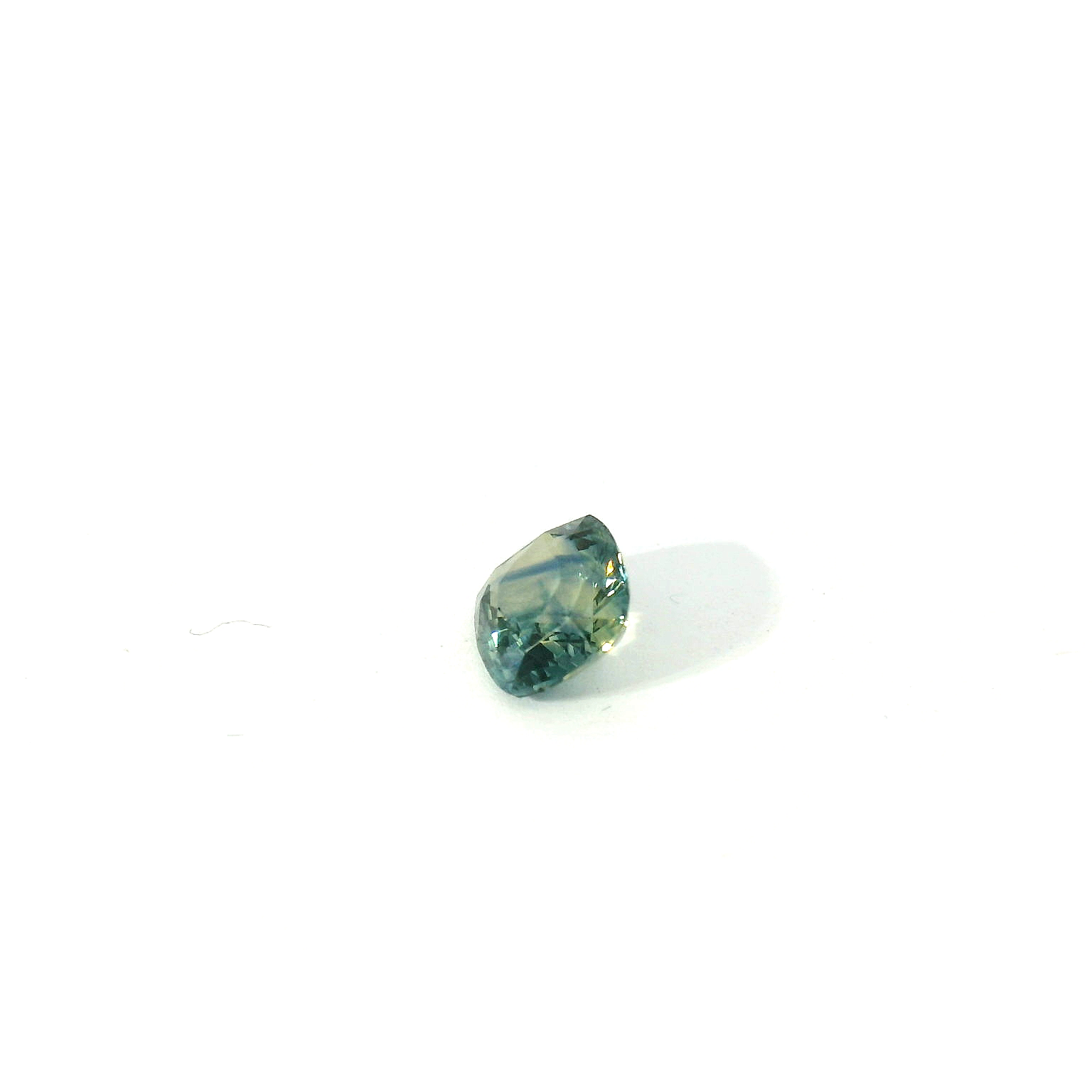 green cushion cut sapphire