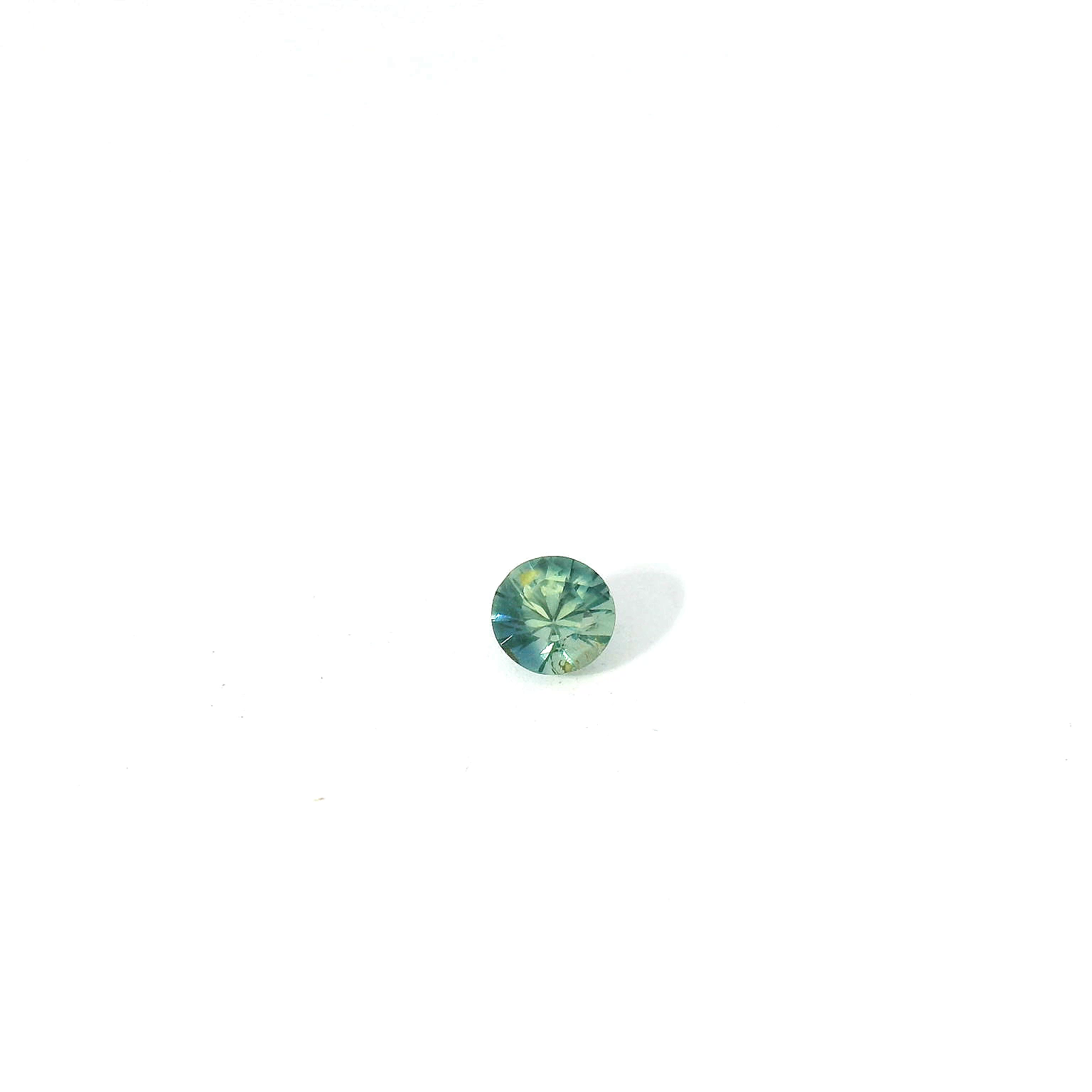 round teal sapphire