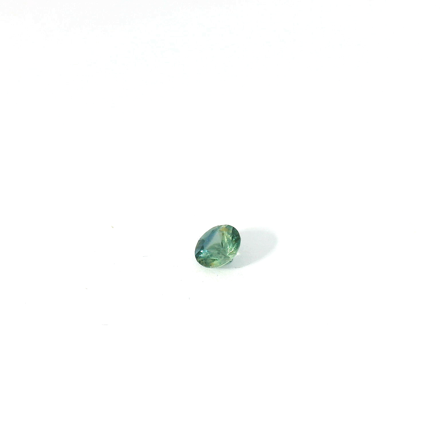 round teal sapphire