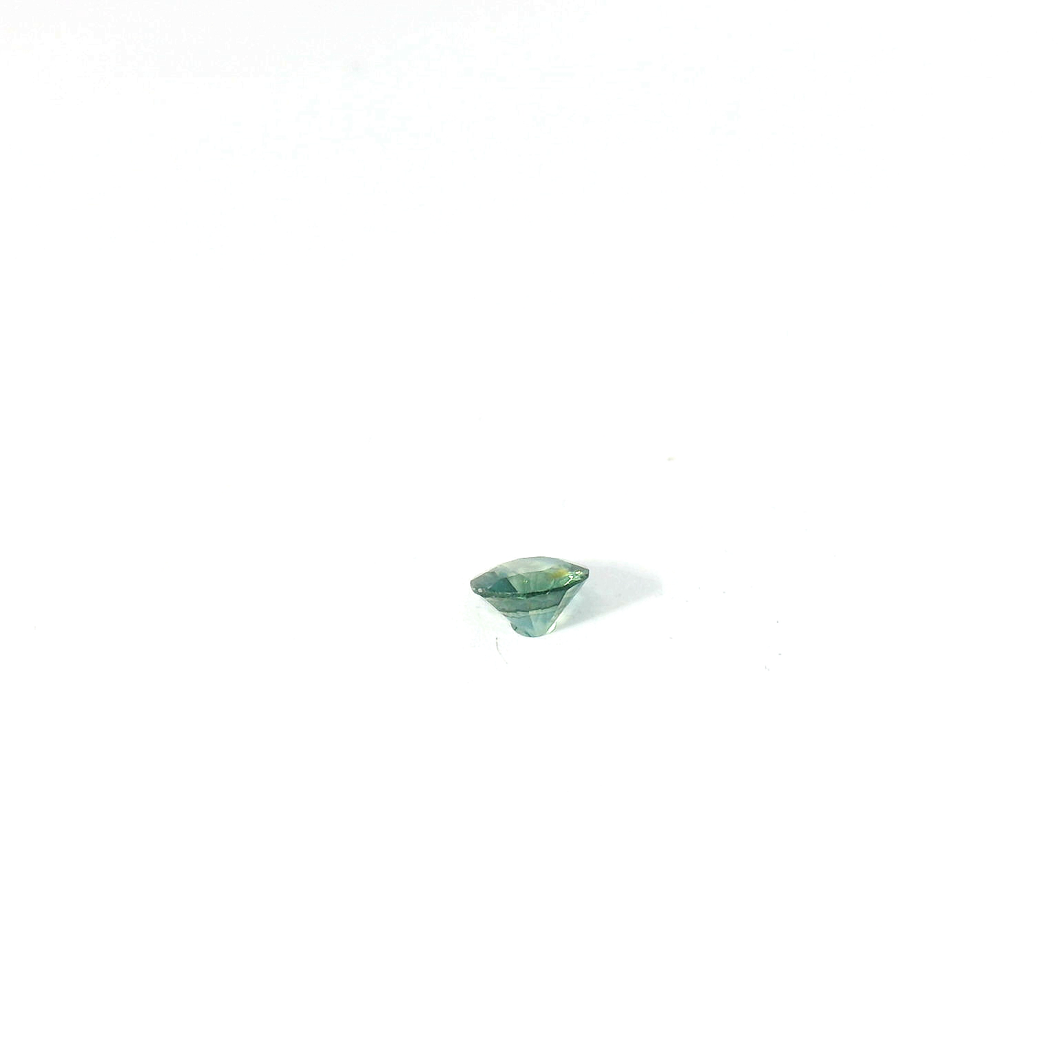 round teal sapphire