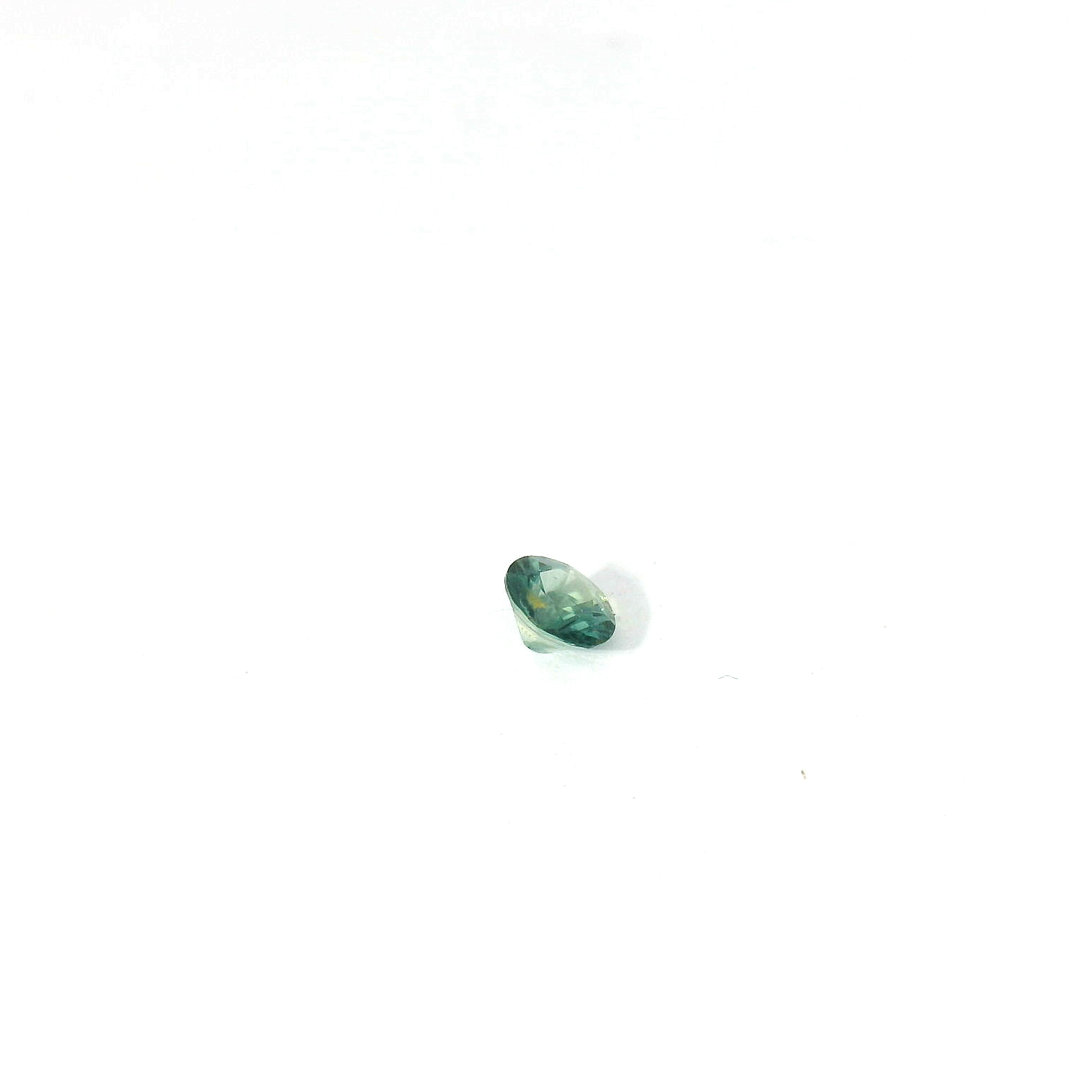 round teal sapphire