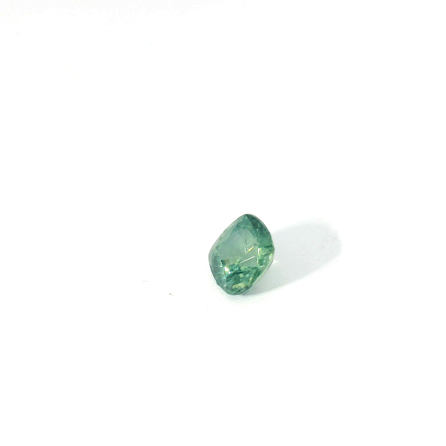 green cushion sapphire