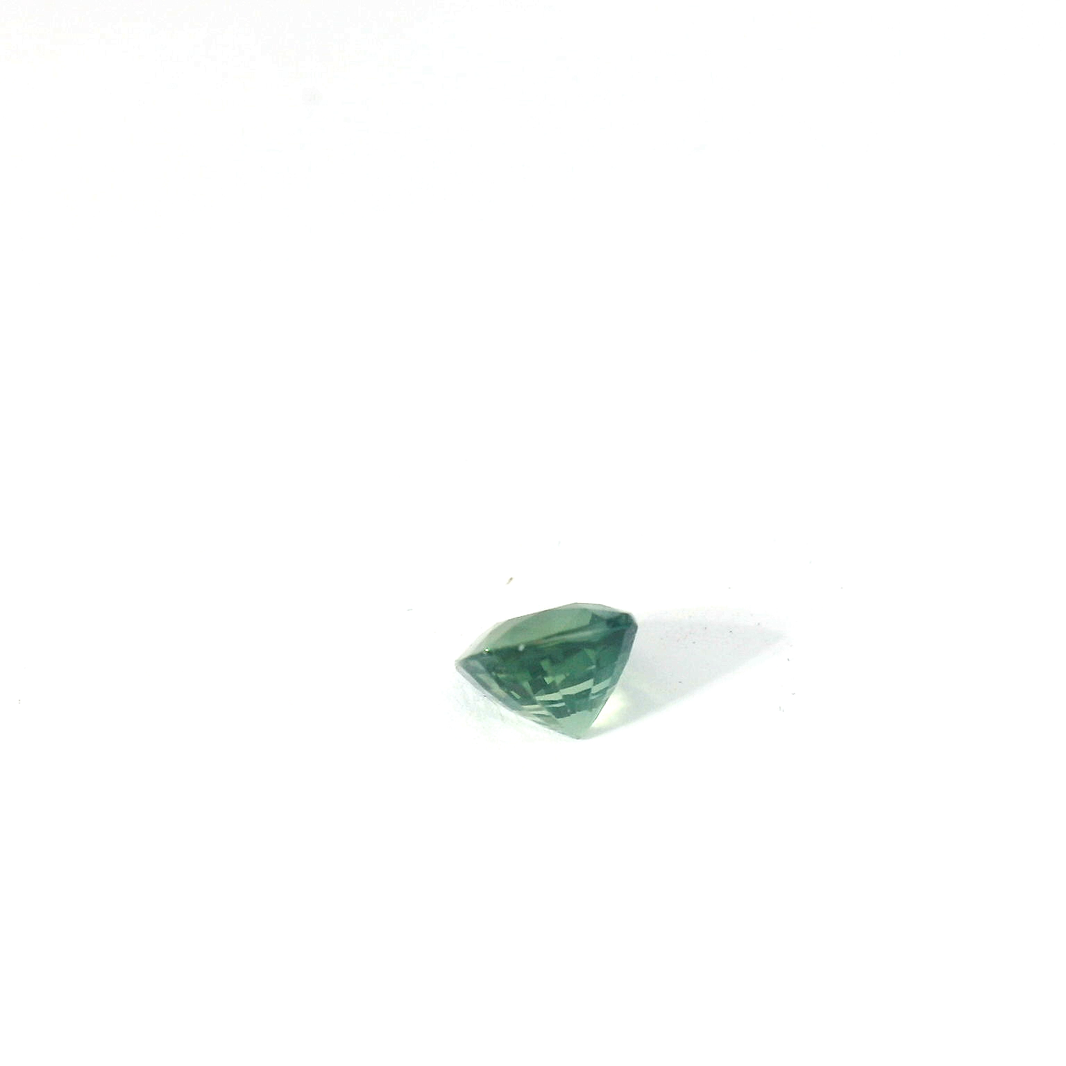 green cushion sapphire
