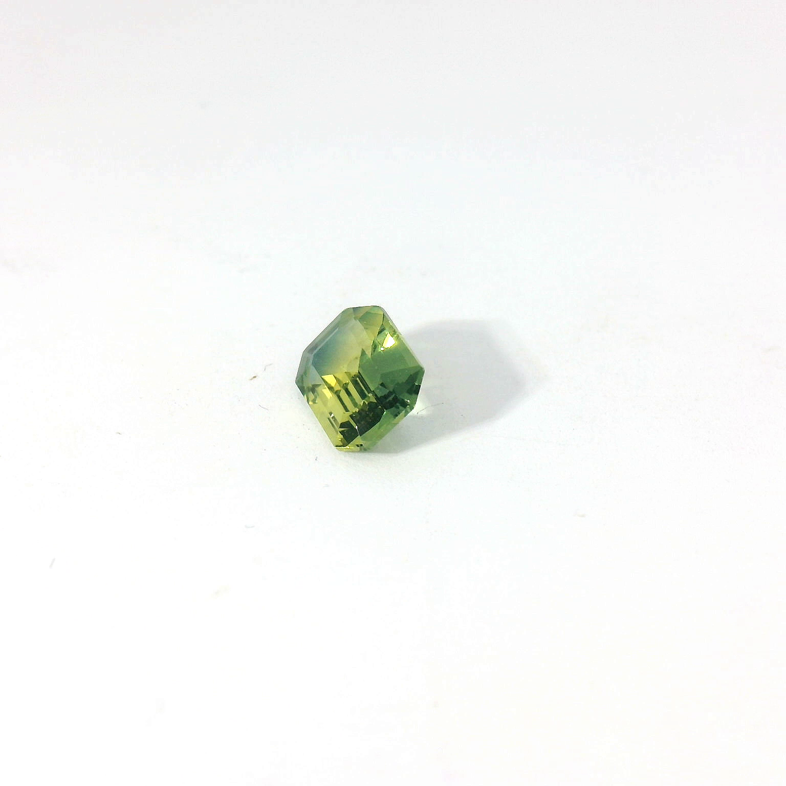 green emerald cut sapphire