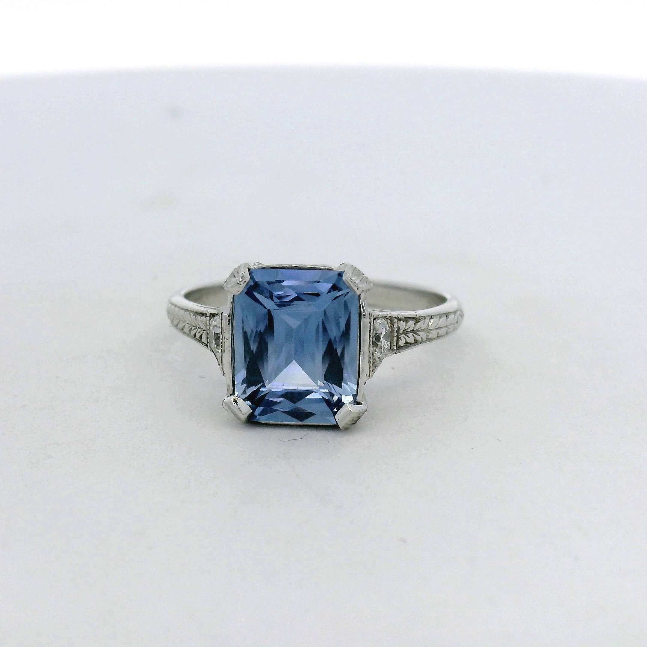 18kt White Gold Medium Blue Sapphire Engraved Solitaire Ring