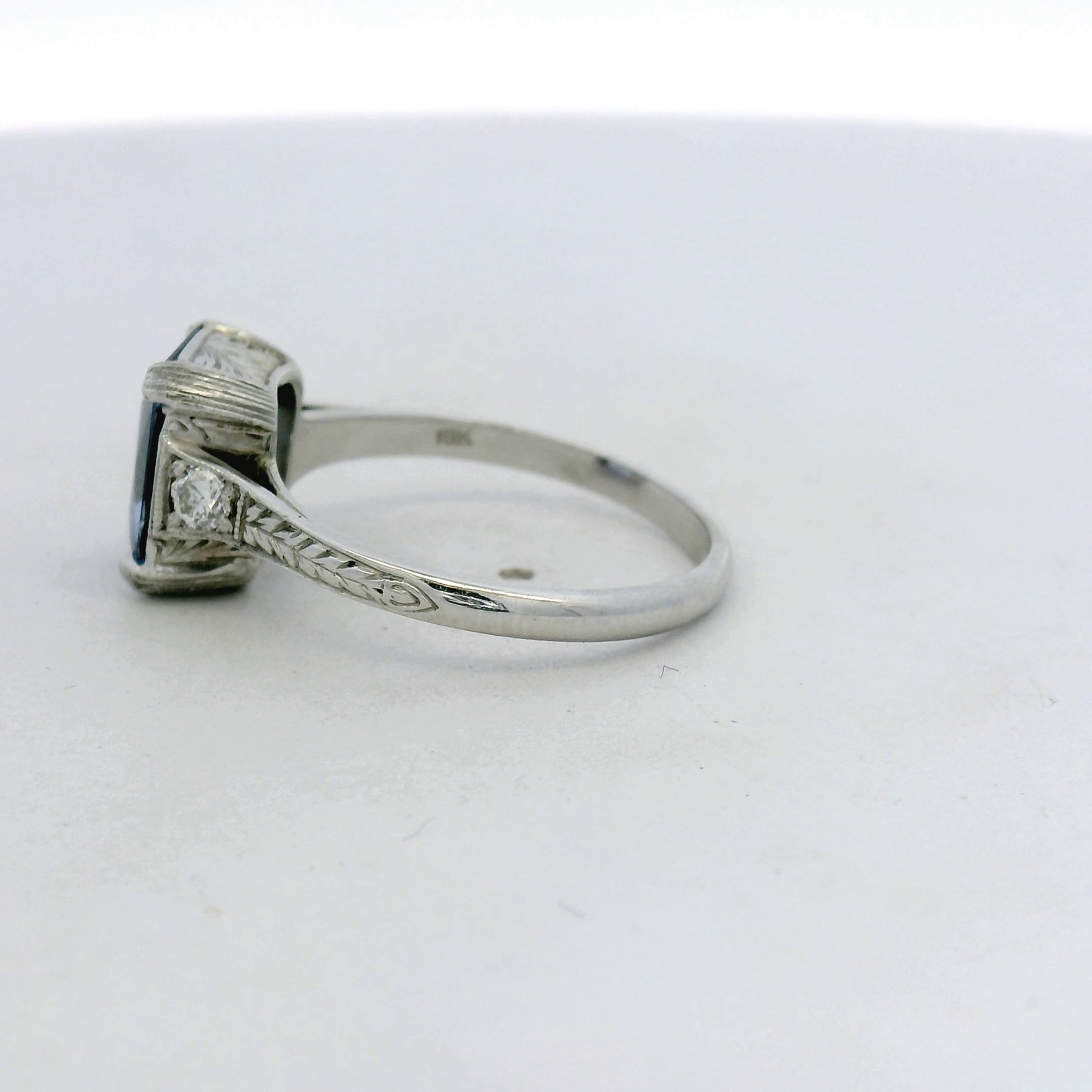 18kt White Gold Medium Blue Sapphire Engraved Solitaire Ring