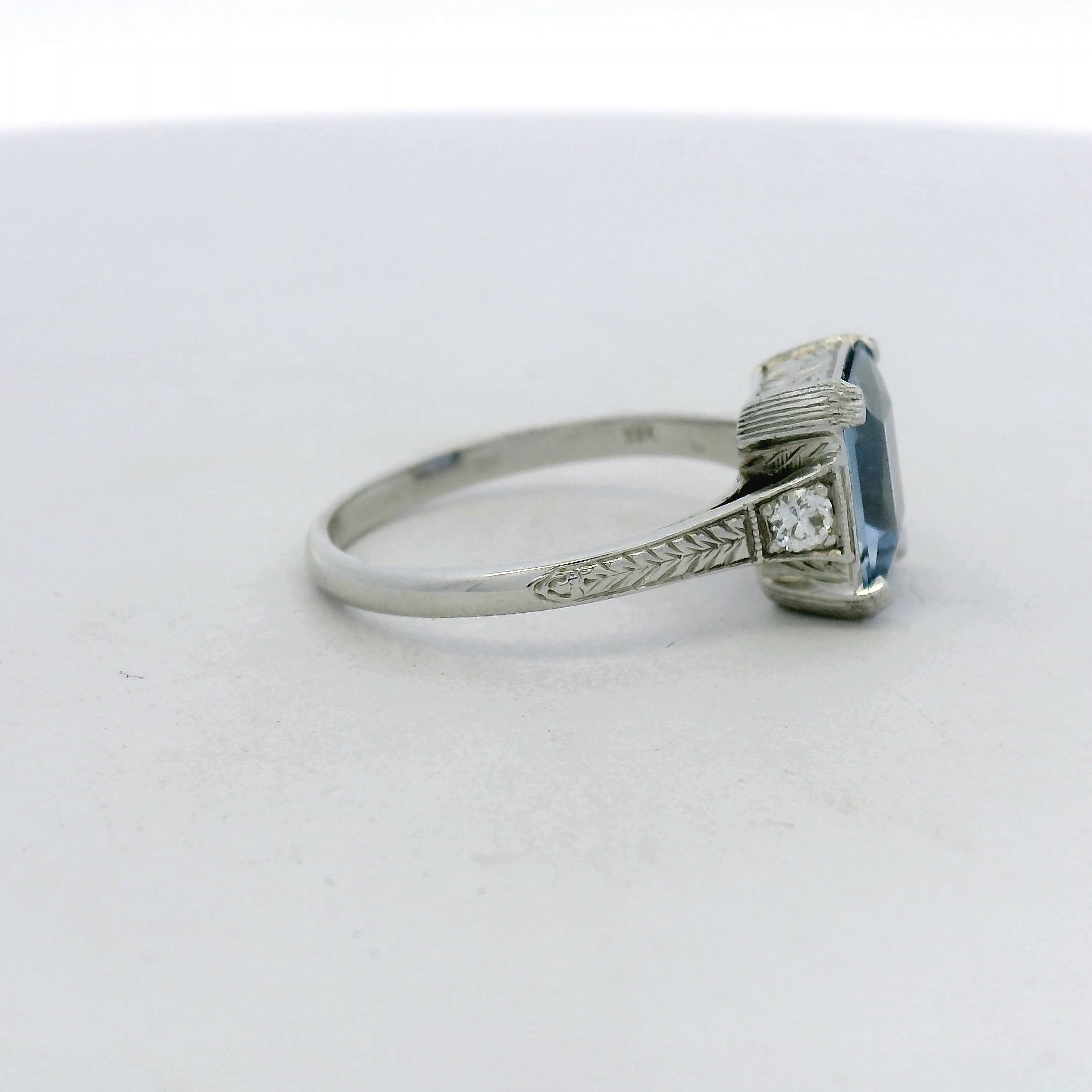 18kt White Gold Medium Blue Sapphire Engraved Solitaire Ring
