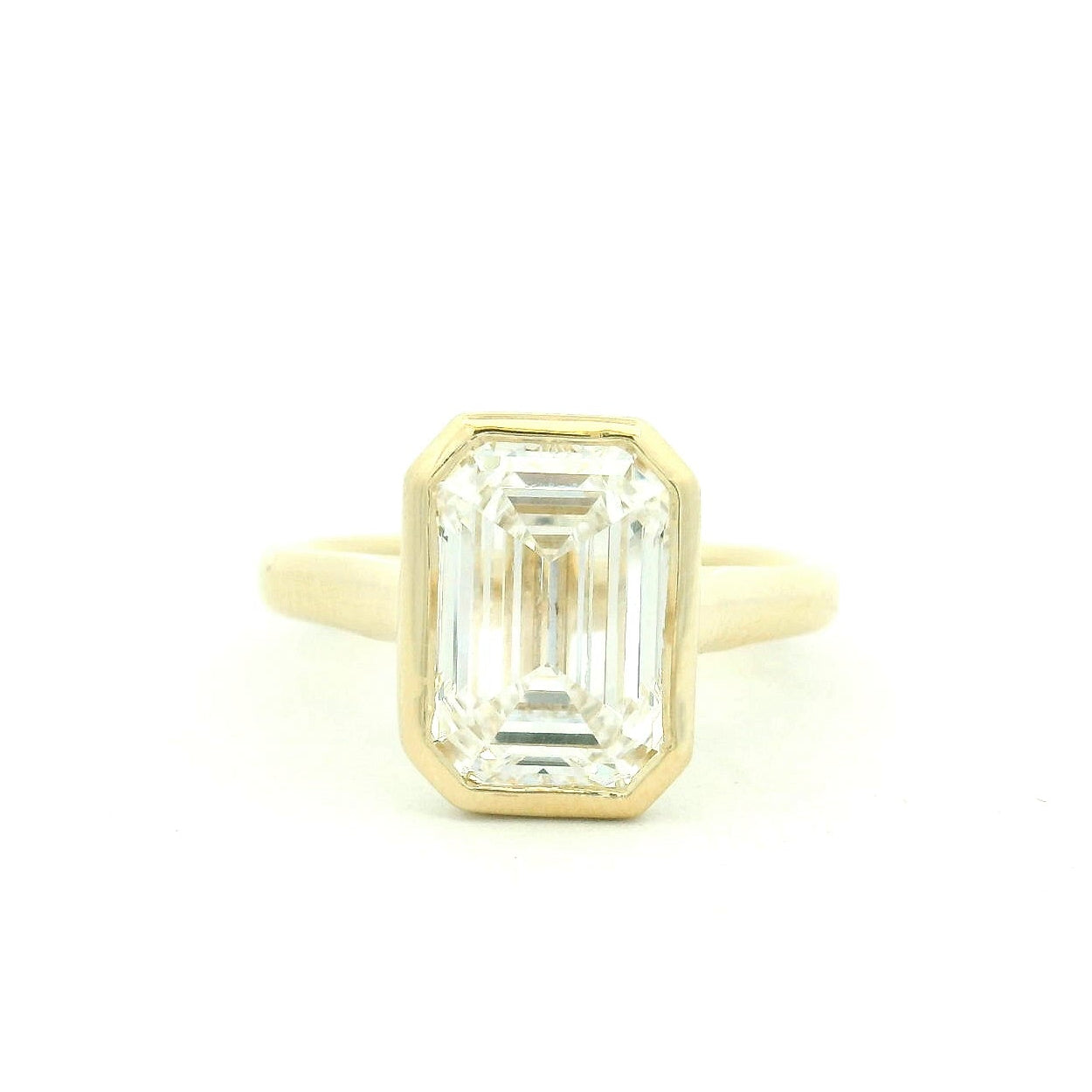 Bezel set Emerald-Cut Diamond