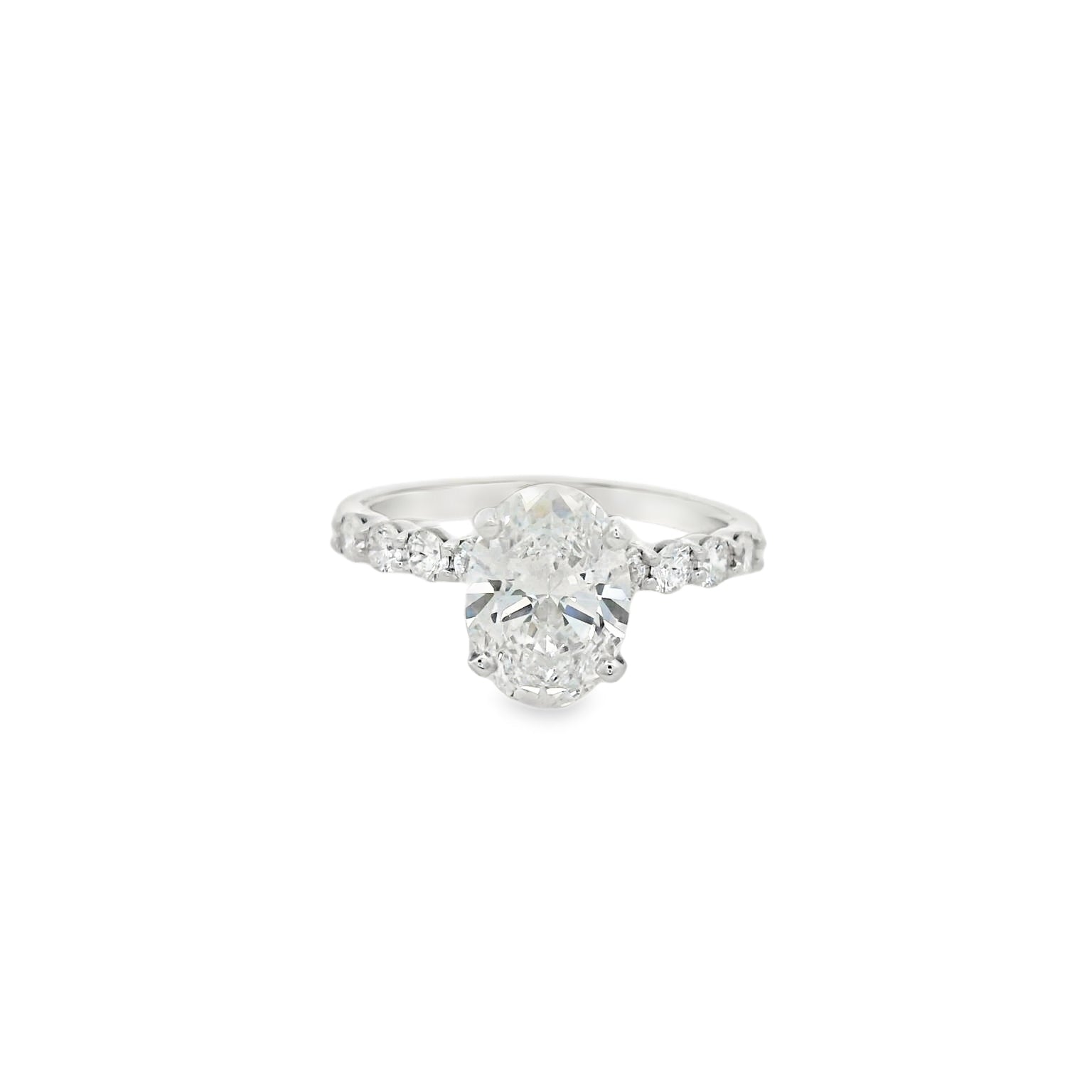Platinum Multistone Ring with Oval Cut Diamond