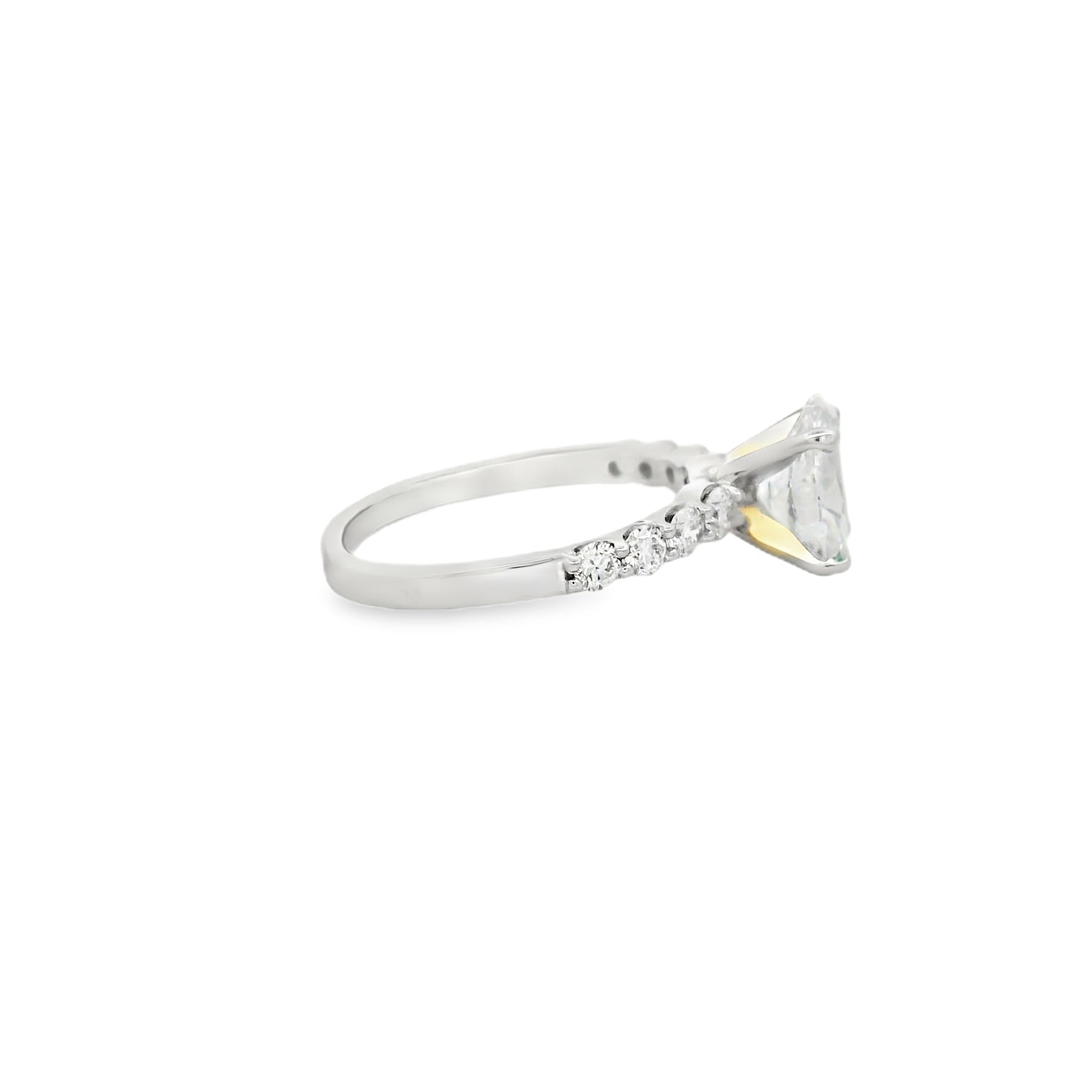 Platinum Multistone Ring with Oval Cut Diamond