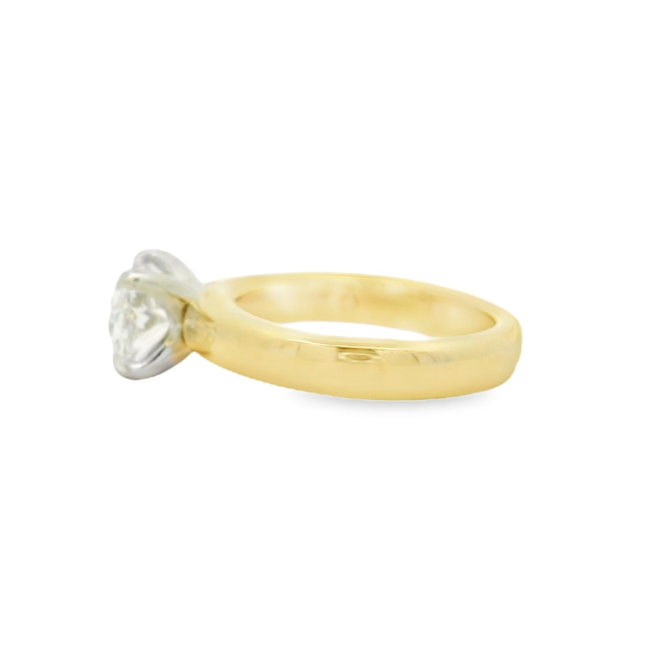 14kt yg band with 14k wg head east west oval prong set