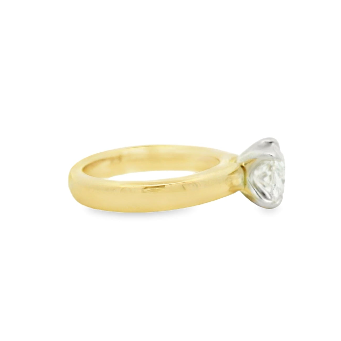 14kt yg band with 14k wg head east west oval prong set
