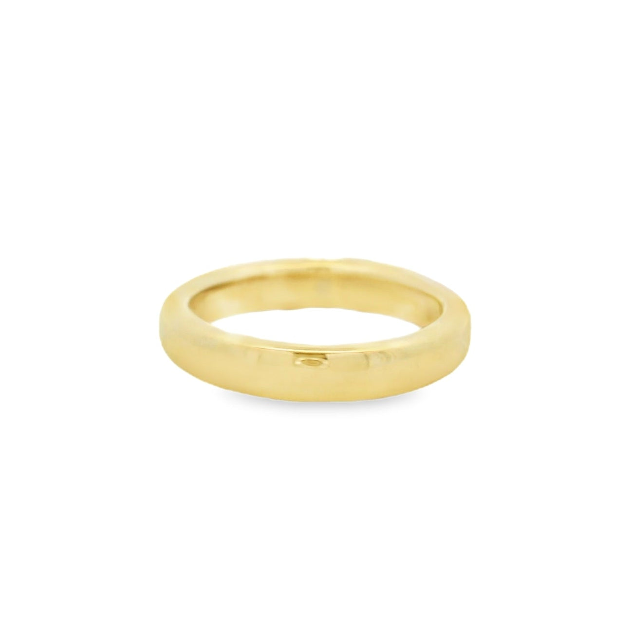 14kt yg band with 14k wg head east west oval prong set