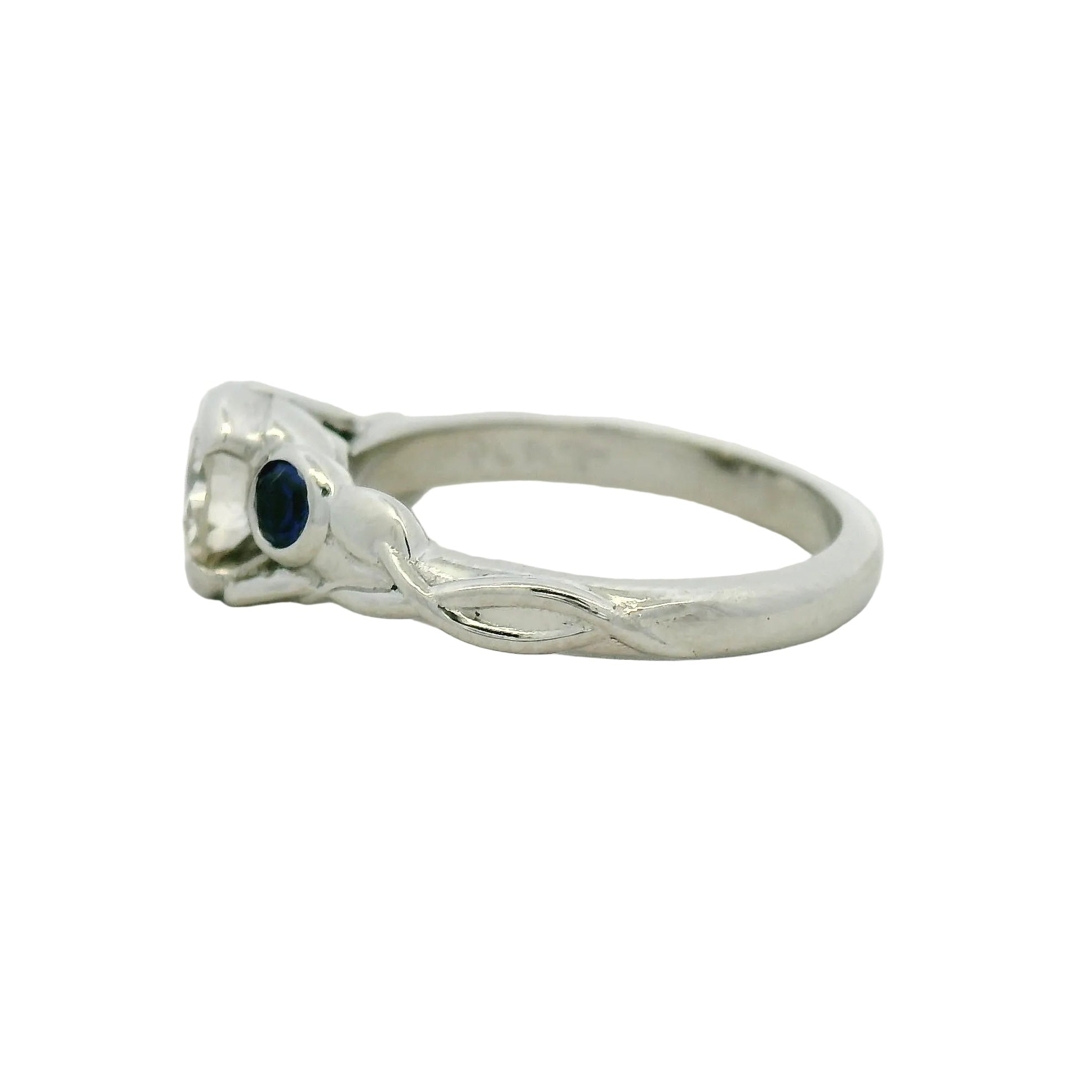 Platinum custom made engagement ring with a floral pattern