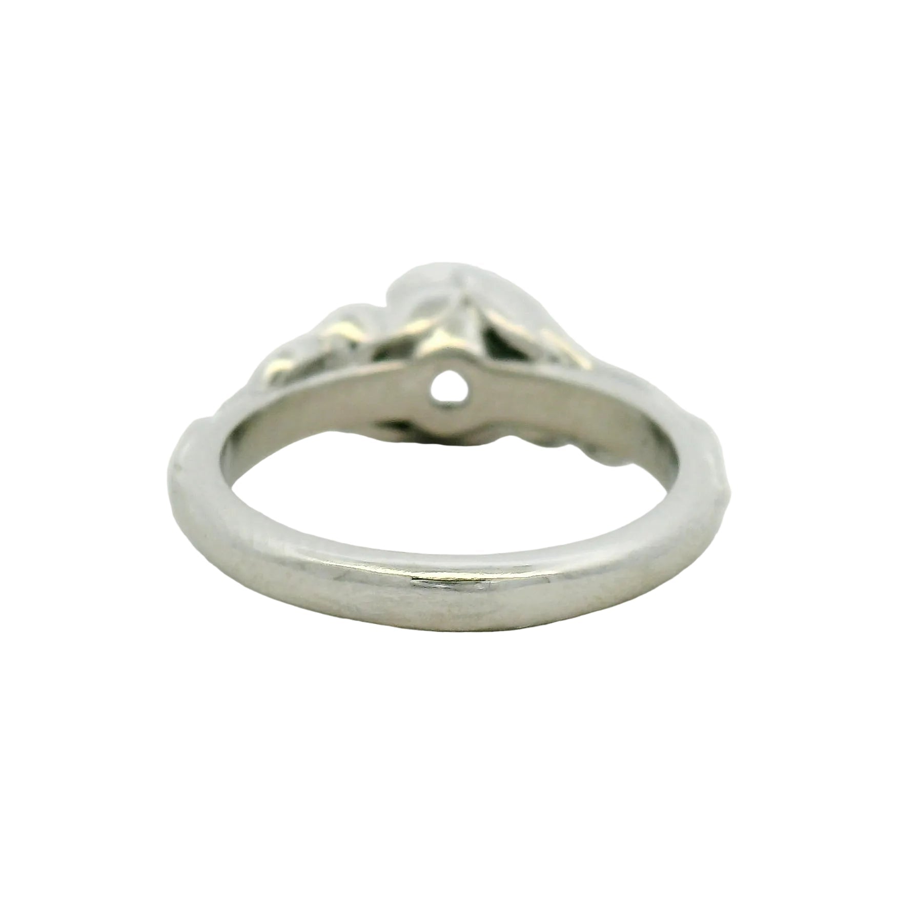 Platinum custom made engagement ring with a floral pattern