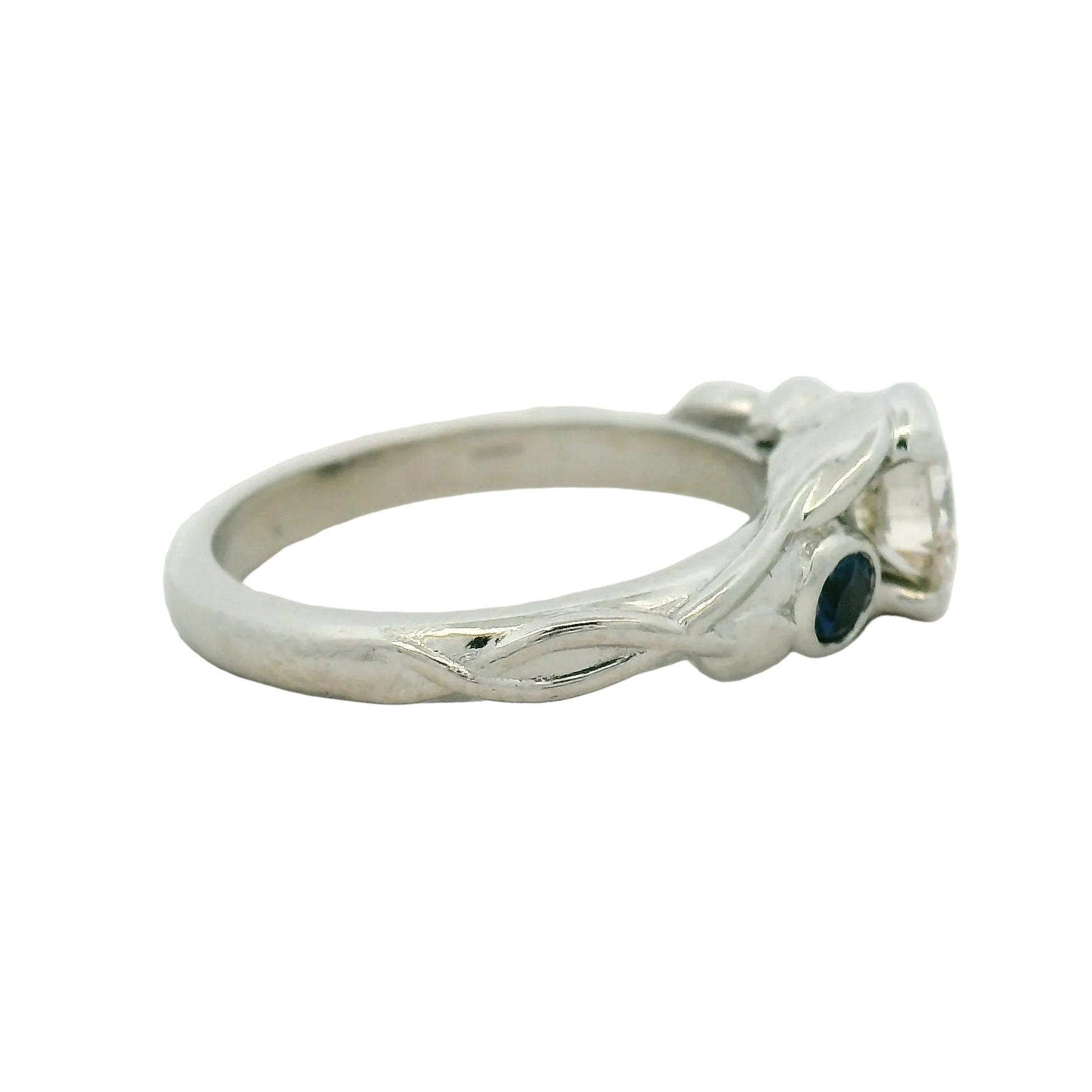 Platinum custom made engagement ring with a floral pattern
