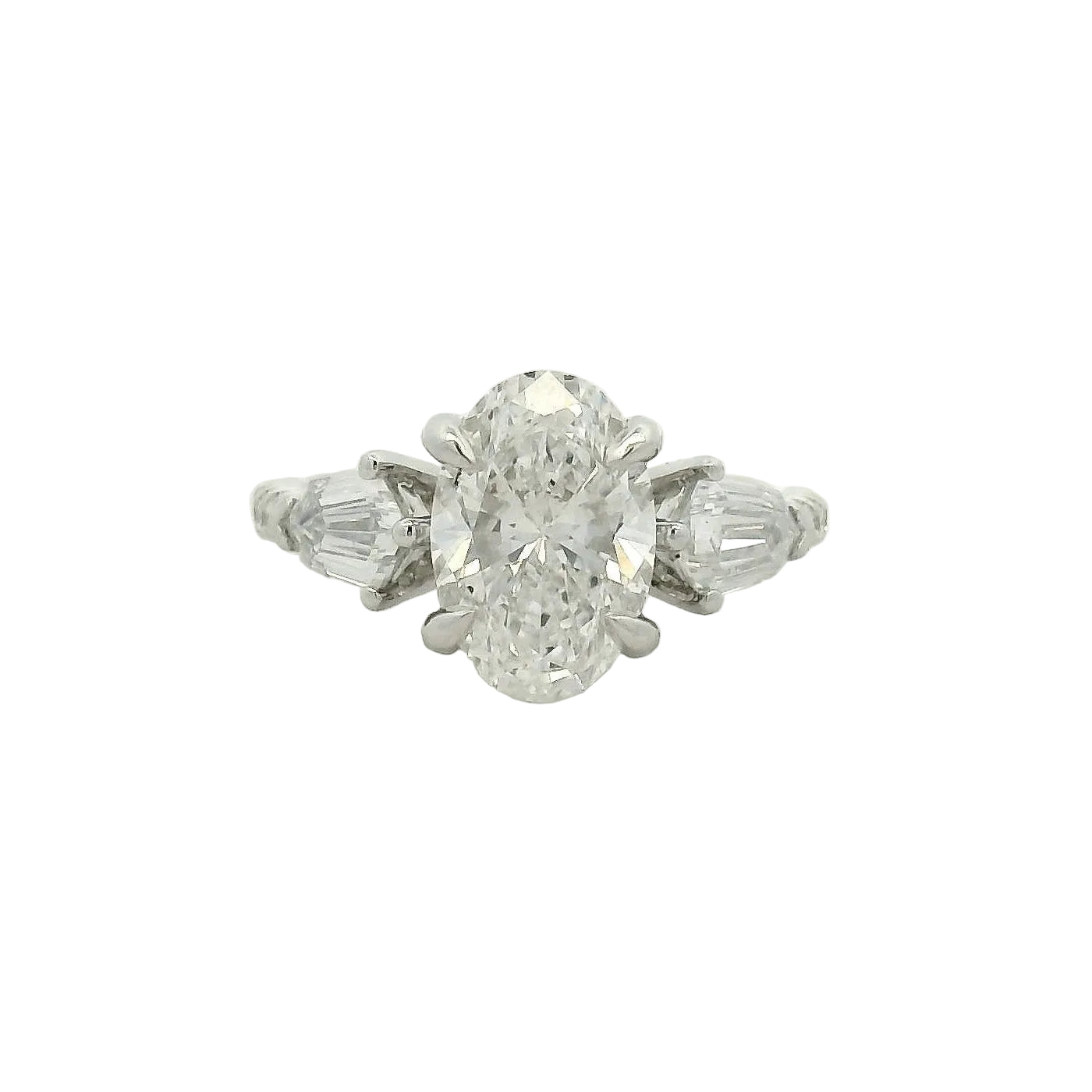 Oval Diamond Three-Stone Ring in White Gold
