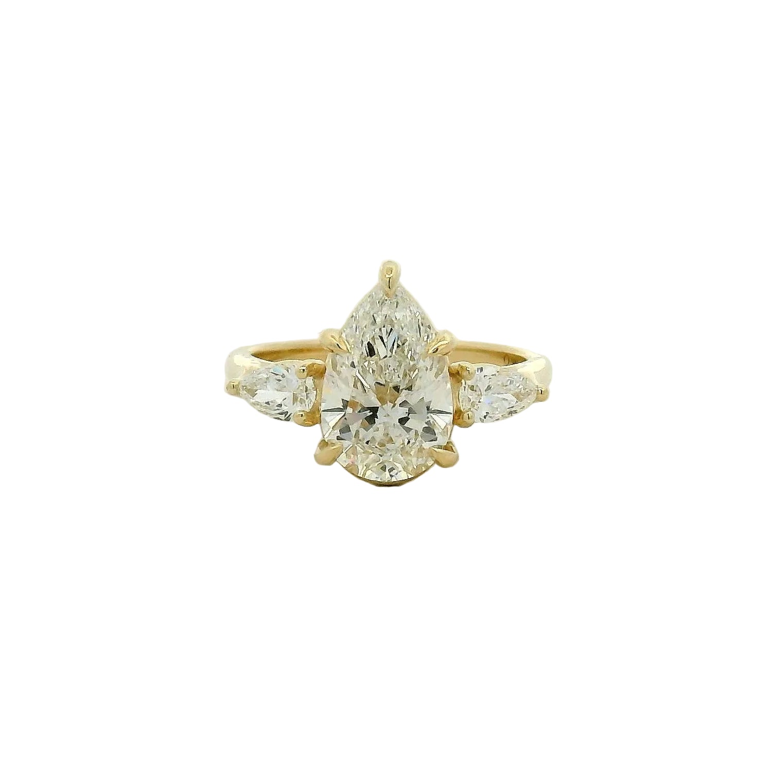 Pear Cut Three-Stone Diamond Engagement Ring in Yellow Gold