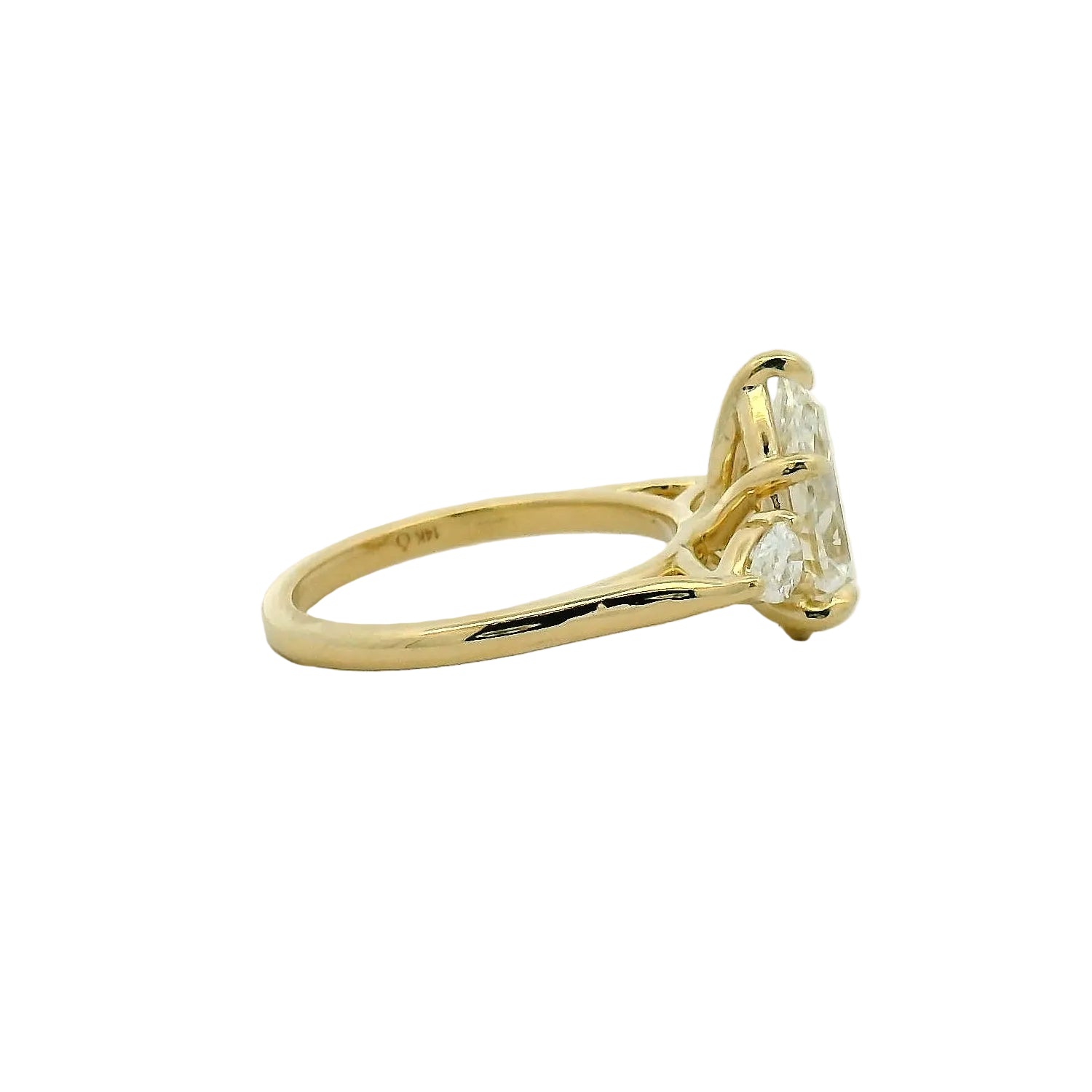 Pear Cut Three-Stone Diamond Engagement Ring in Yellow Gold
