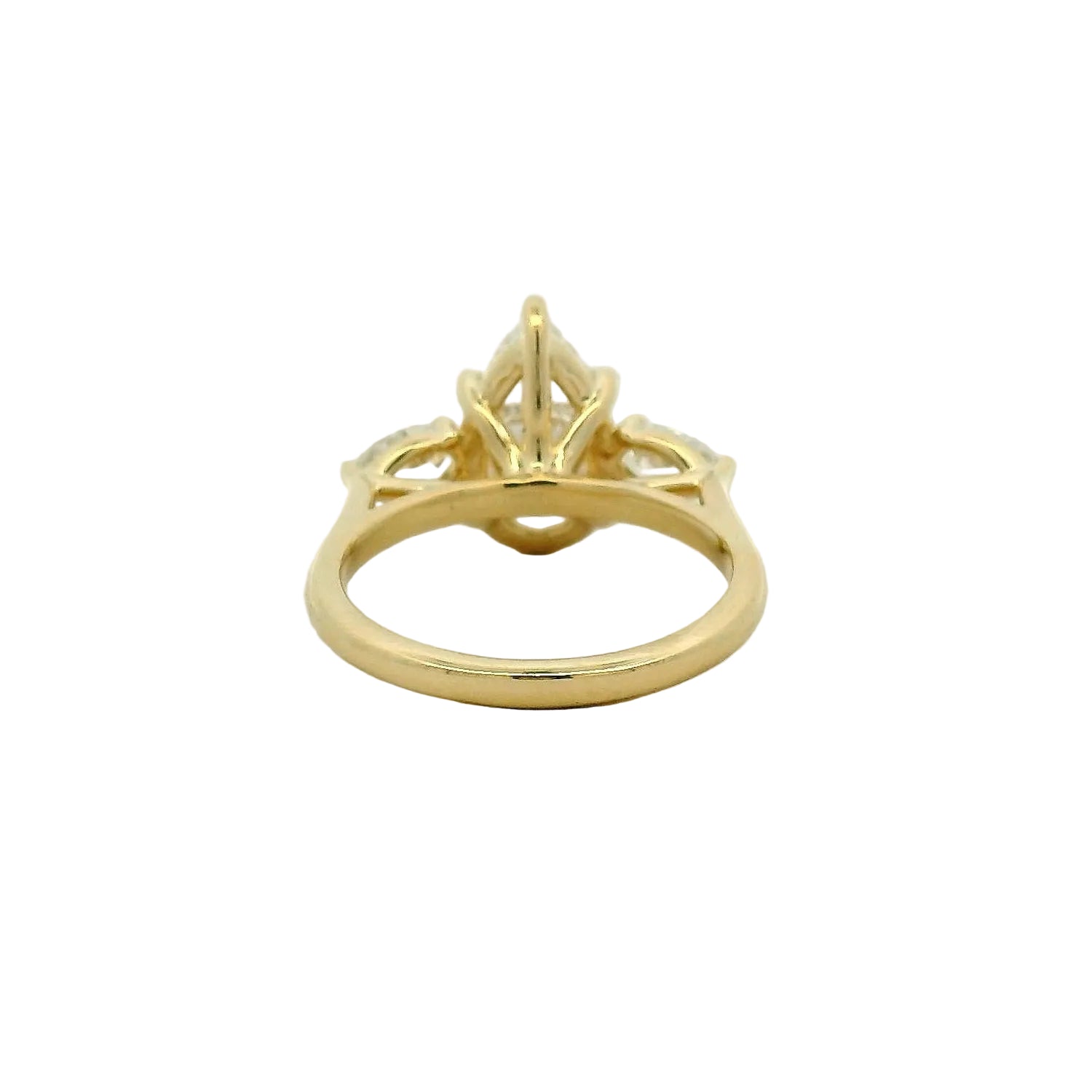 Pear Cut Three-Stone Diamond Engagement Ring in Yellow Gold