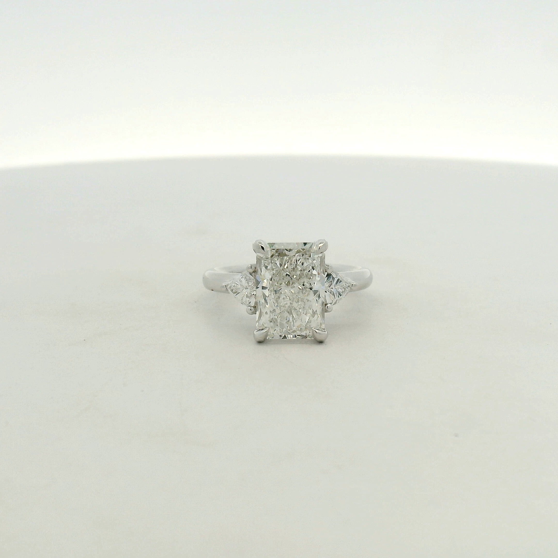 Radiant Cut Three-Stone Diamond Ring in White Gold