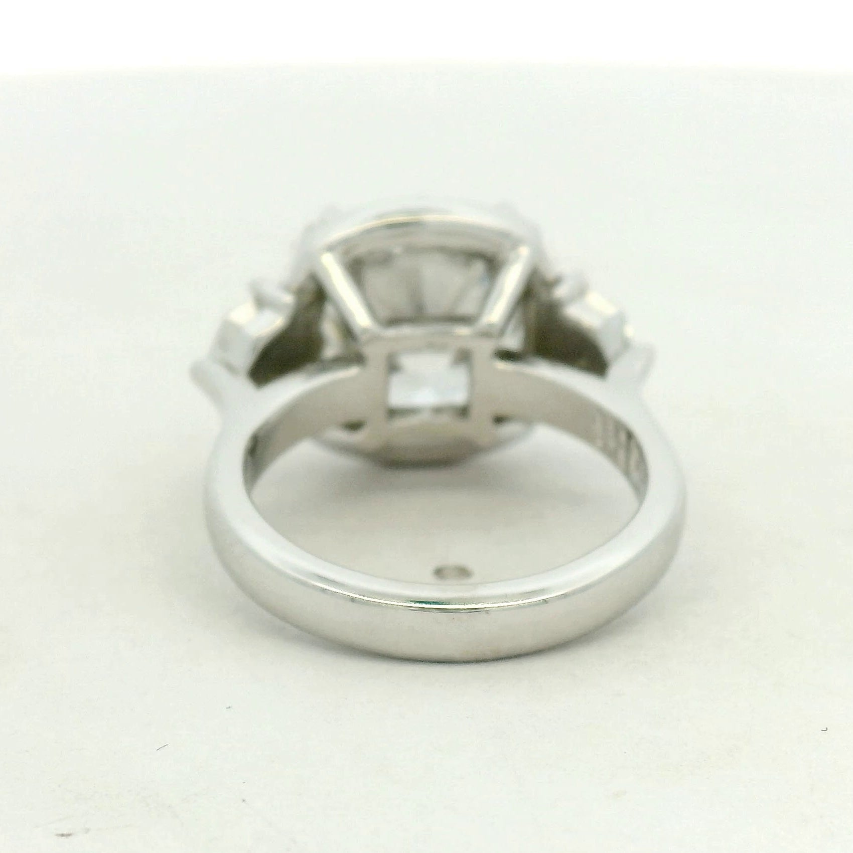 THREE STONE RING WITH HALO