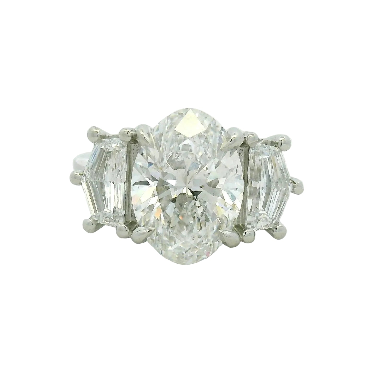Oval Diamond Three-Stone Ring in White Gold