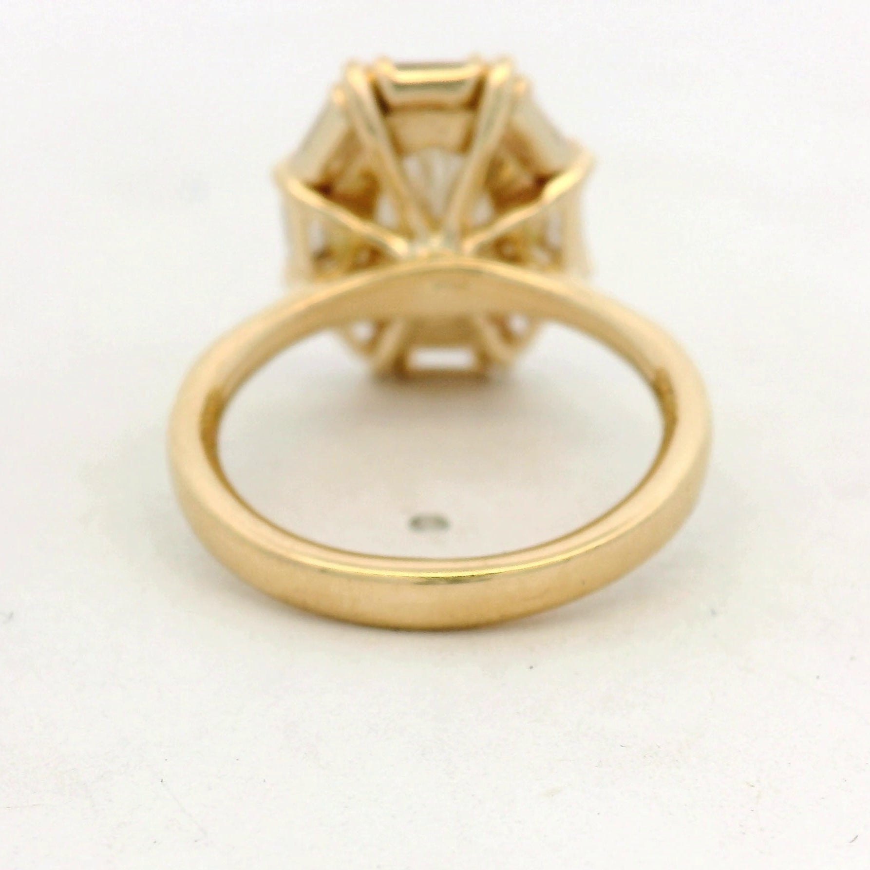 Oval Diamond Baguette Halo Ring in Yellow Gold