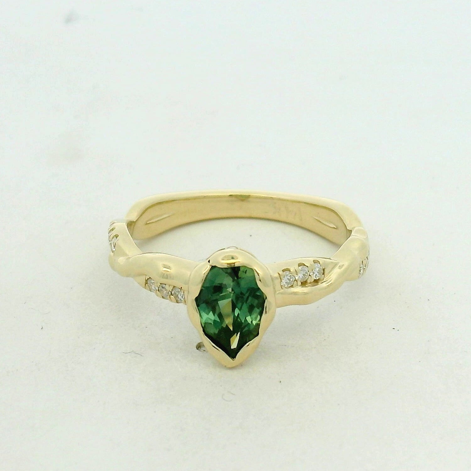 Green Tourmaline Bezel Solitaire Ring in Yellow Gold