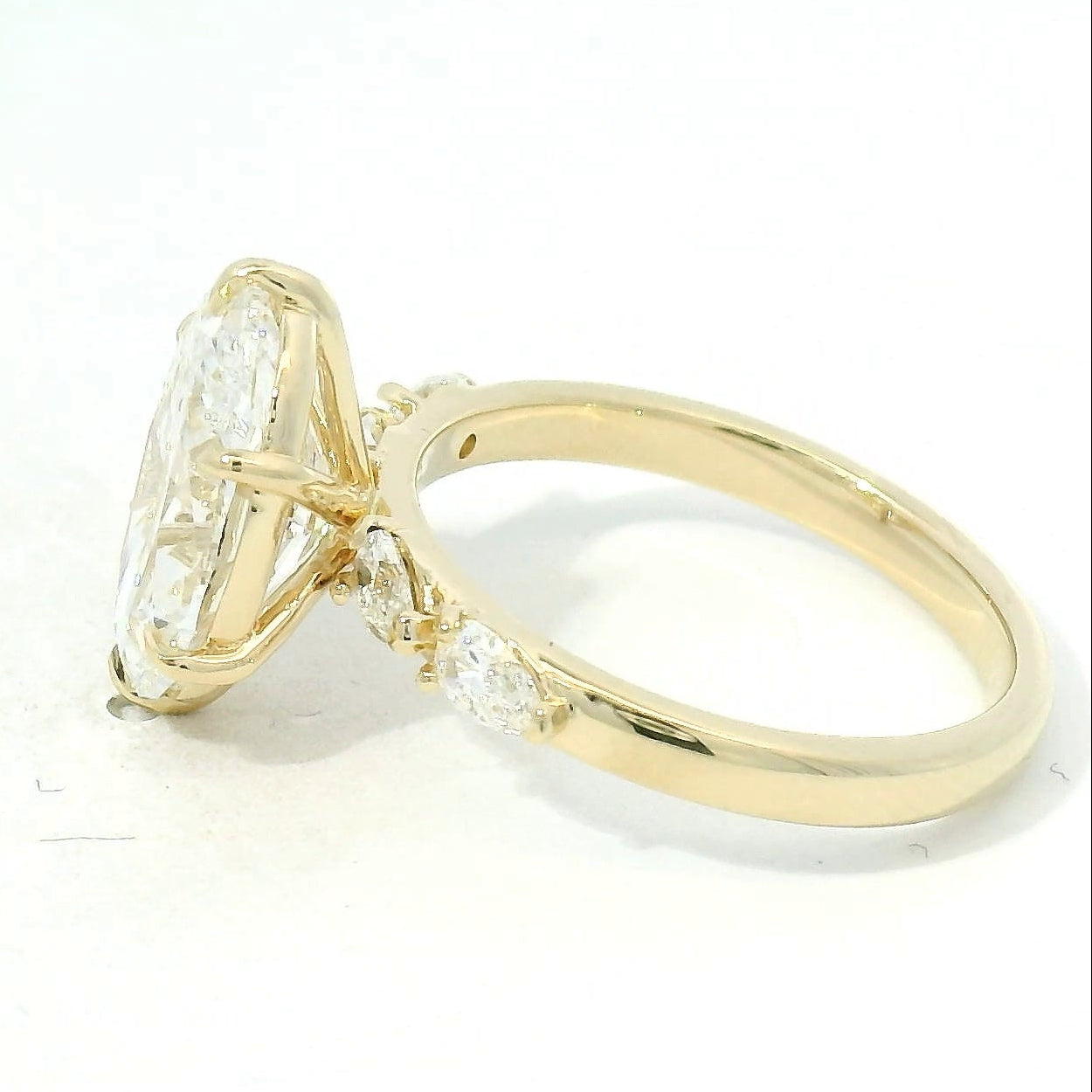 Yellow Gold Oval Diamond Engagement Ring with Side Stones