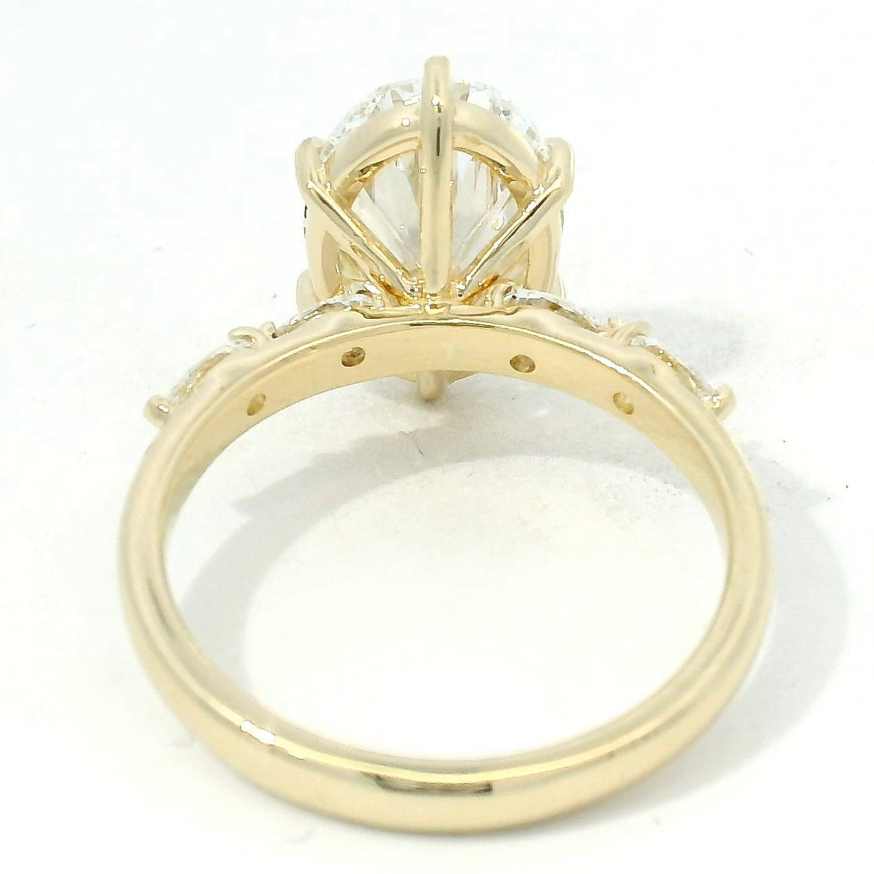 Yellow Gold Oval Diamond Engagement Ring with Side Stones