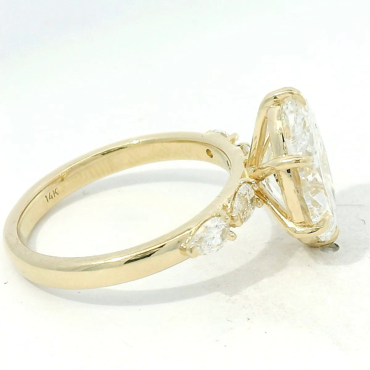 Yellow Gold Oval Diamond Engagement Ring with Side Stones
