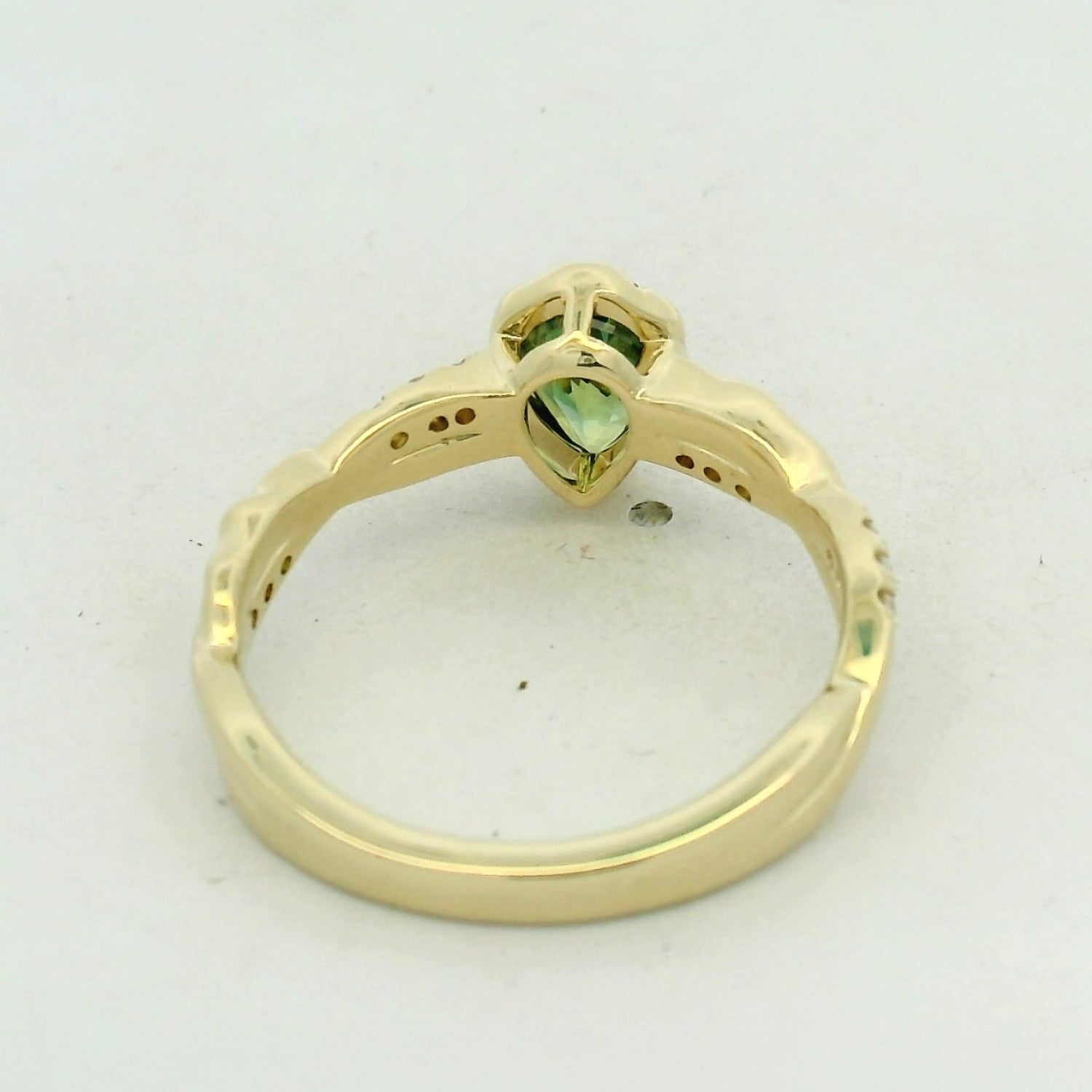 Green Tourmaline Bezel Solitaire Ring in Yellow Gold