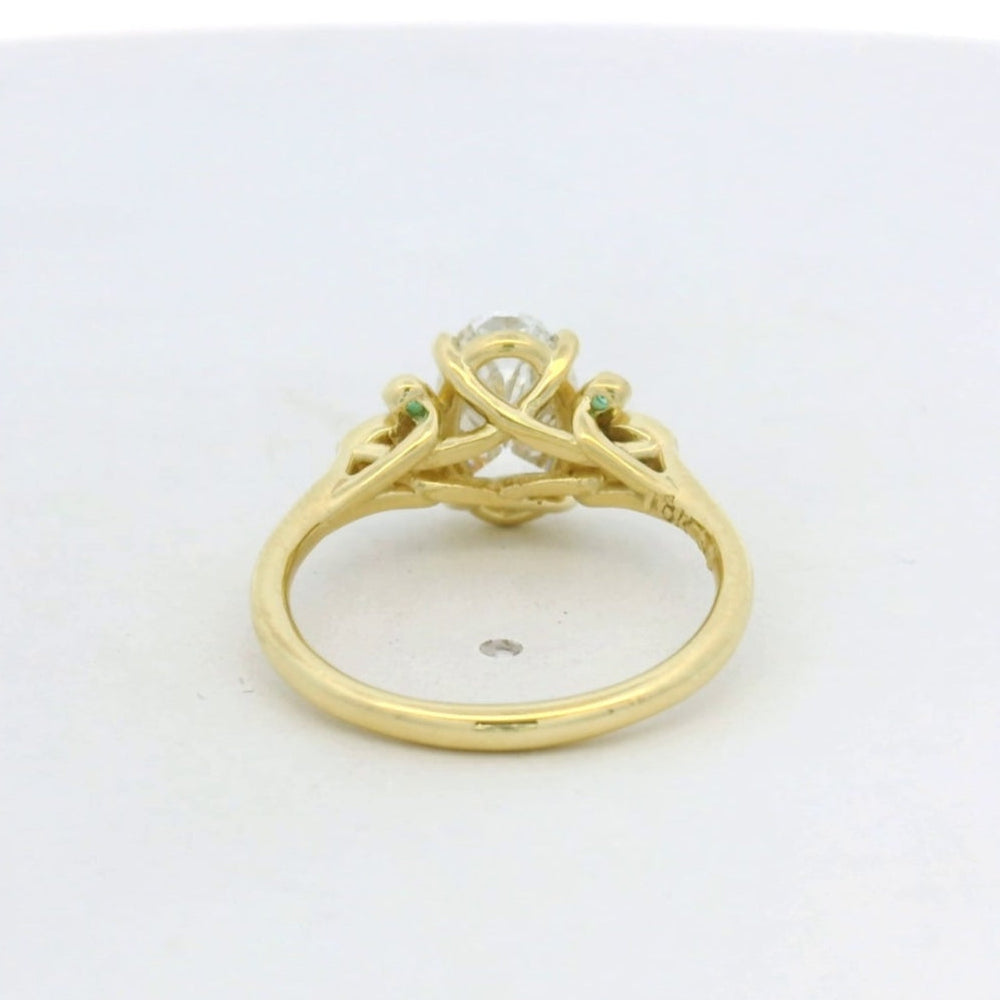 18KT Yellow Gold Oval Diamond Emerald Side Stone engagement ring