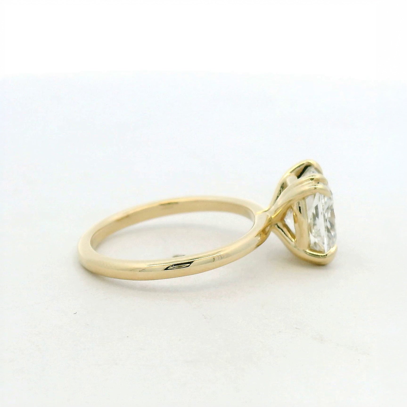 14KT yellow gold double claw prong solitaire cushion engagement ring