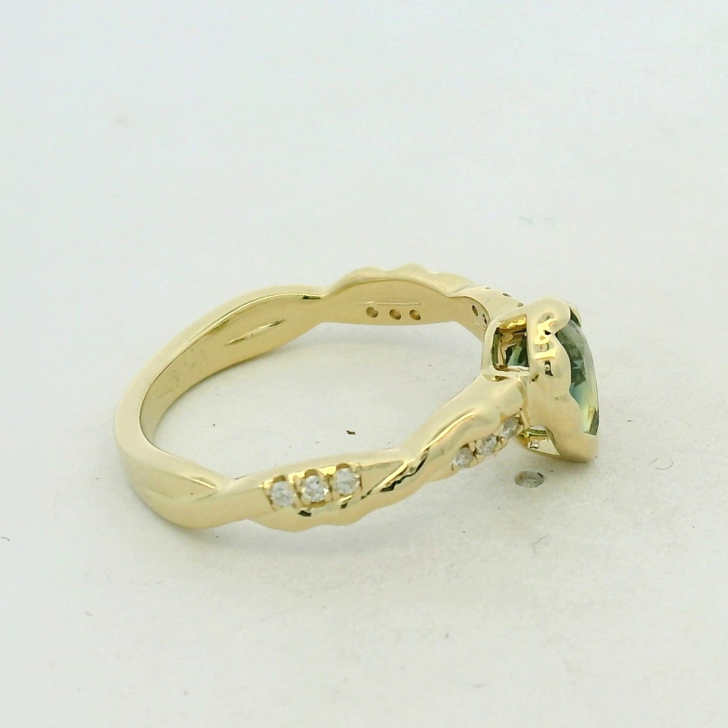 Green Tourmaline Bezel Solitaire Ring in Yellow Gold