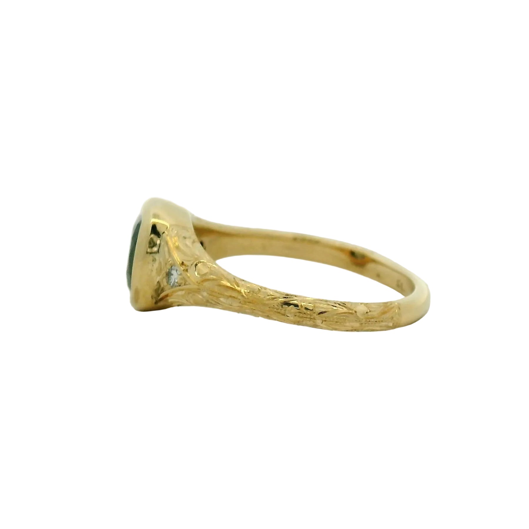 14k yg bezel cushion sapphire ring with small stones and hand engraving