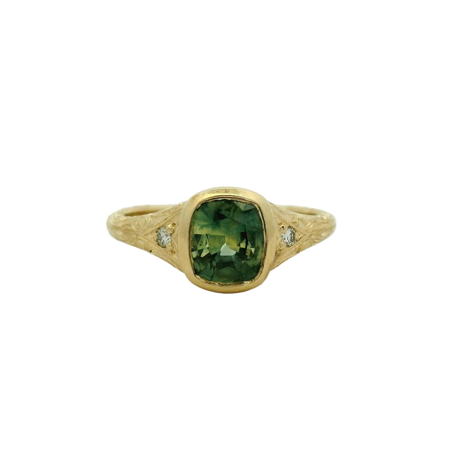 14k yg bezel cushion sapphire ring with small stones and hand engraving