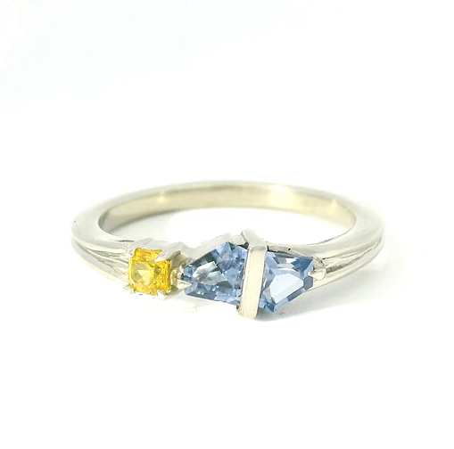 Elegant White Gold Ring with Gemstones