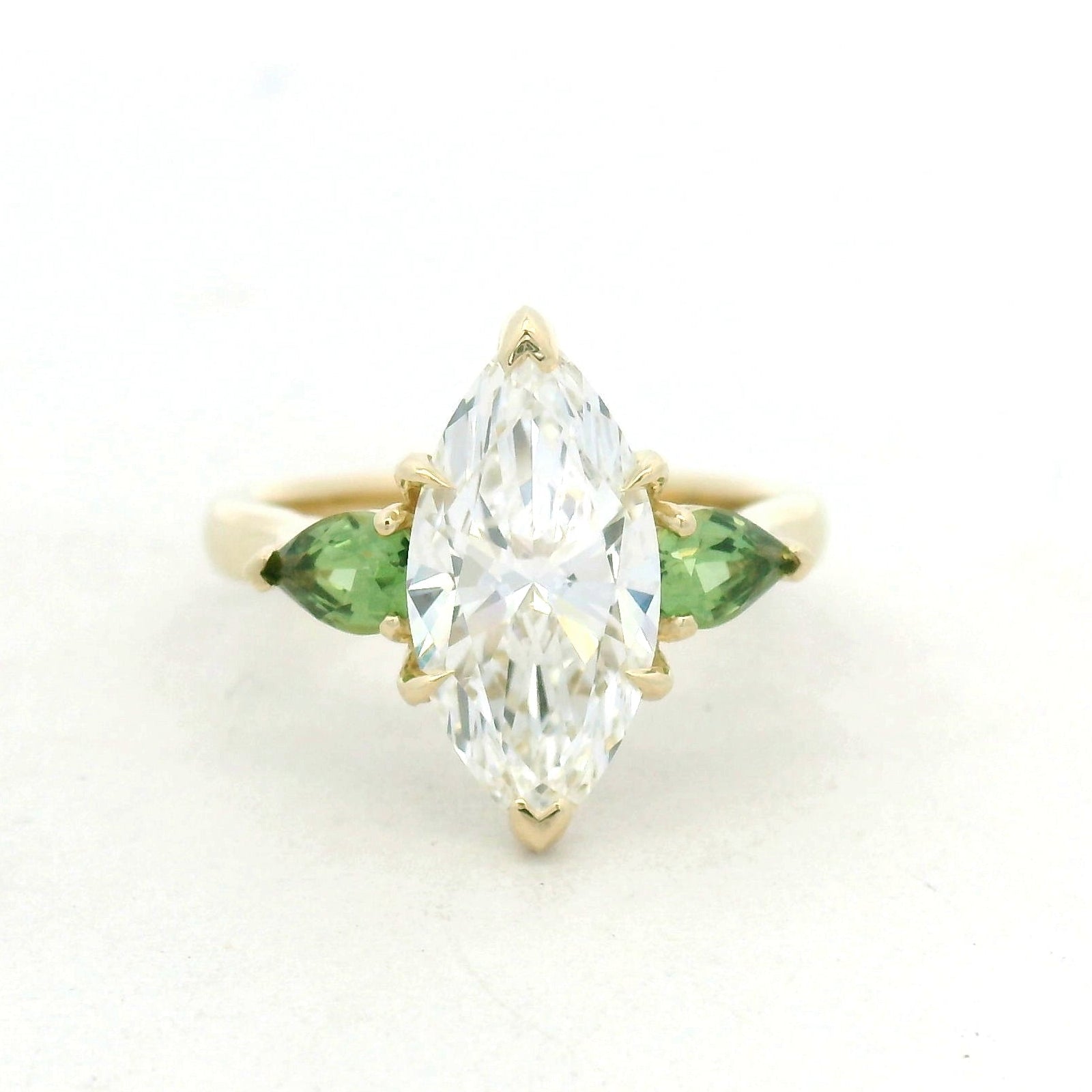 Marquise and Pear Emerald Multi-Stone Ring in Yellow Gold