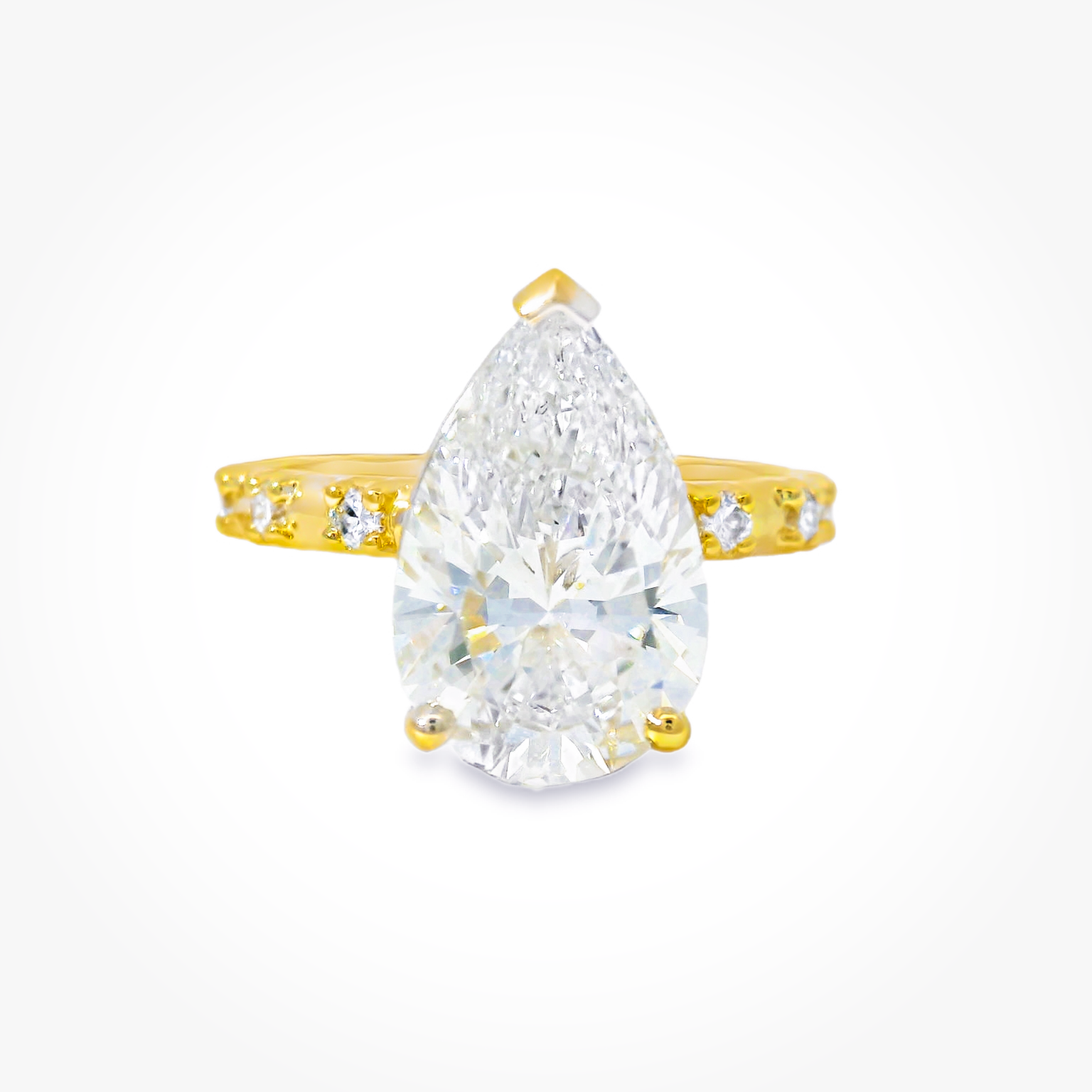 Yellow Gold Multistone Ring with Pear Cut Diamond