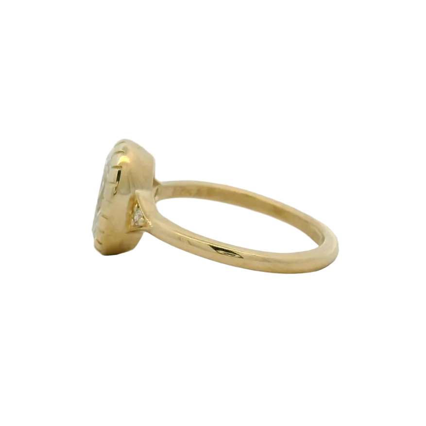 14KT yellow gold oval bezel set side stone engagement ring