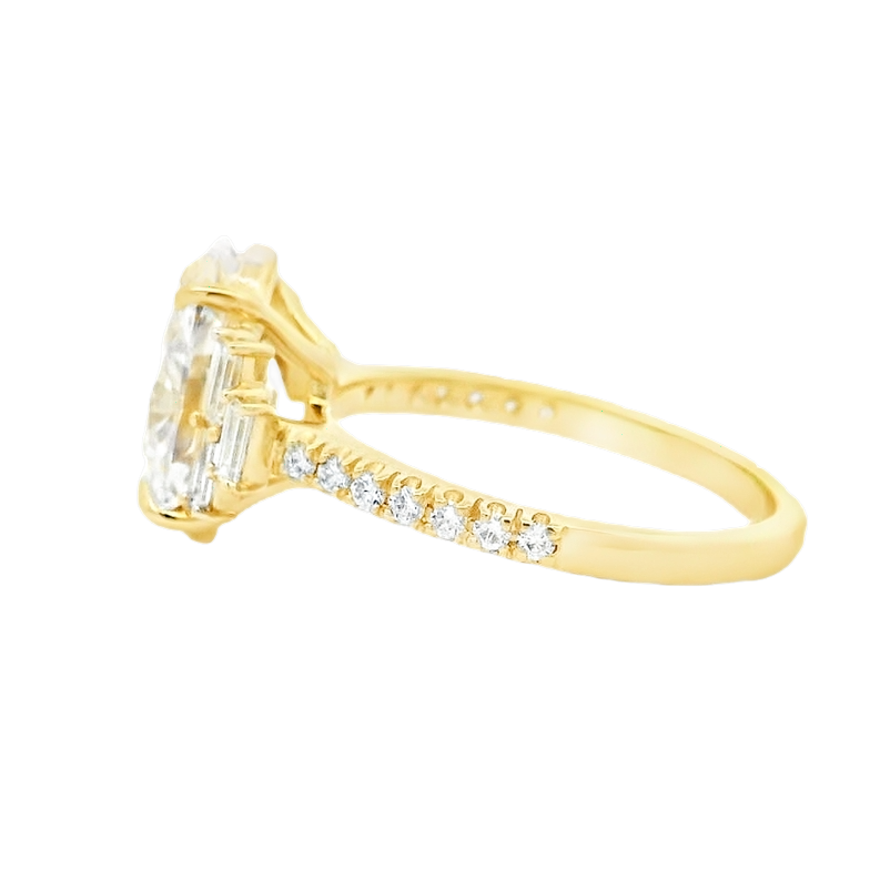 Yellow Gold Oval Diamond Ring with Stepped Baguette Accents