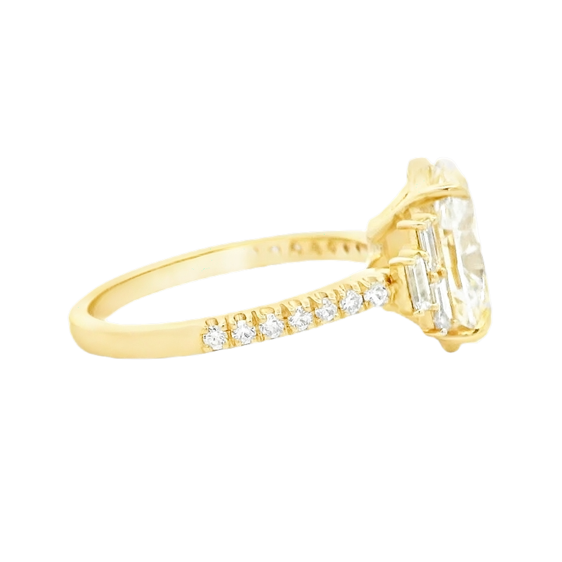 Yellow Gold Oval Diamond Ring with Stepped Baguette Accents