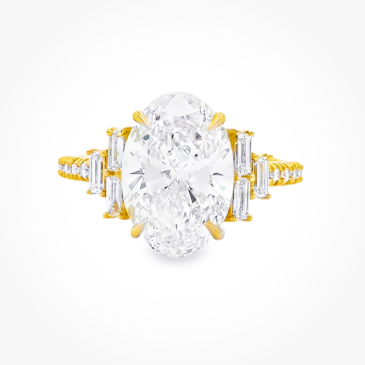 Yellow Gold Oval Diamond Ring with Stepped Baguette Accents
