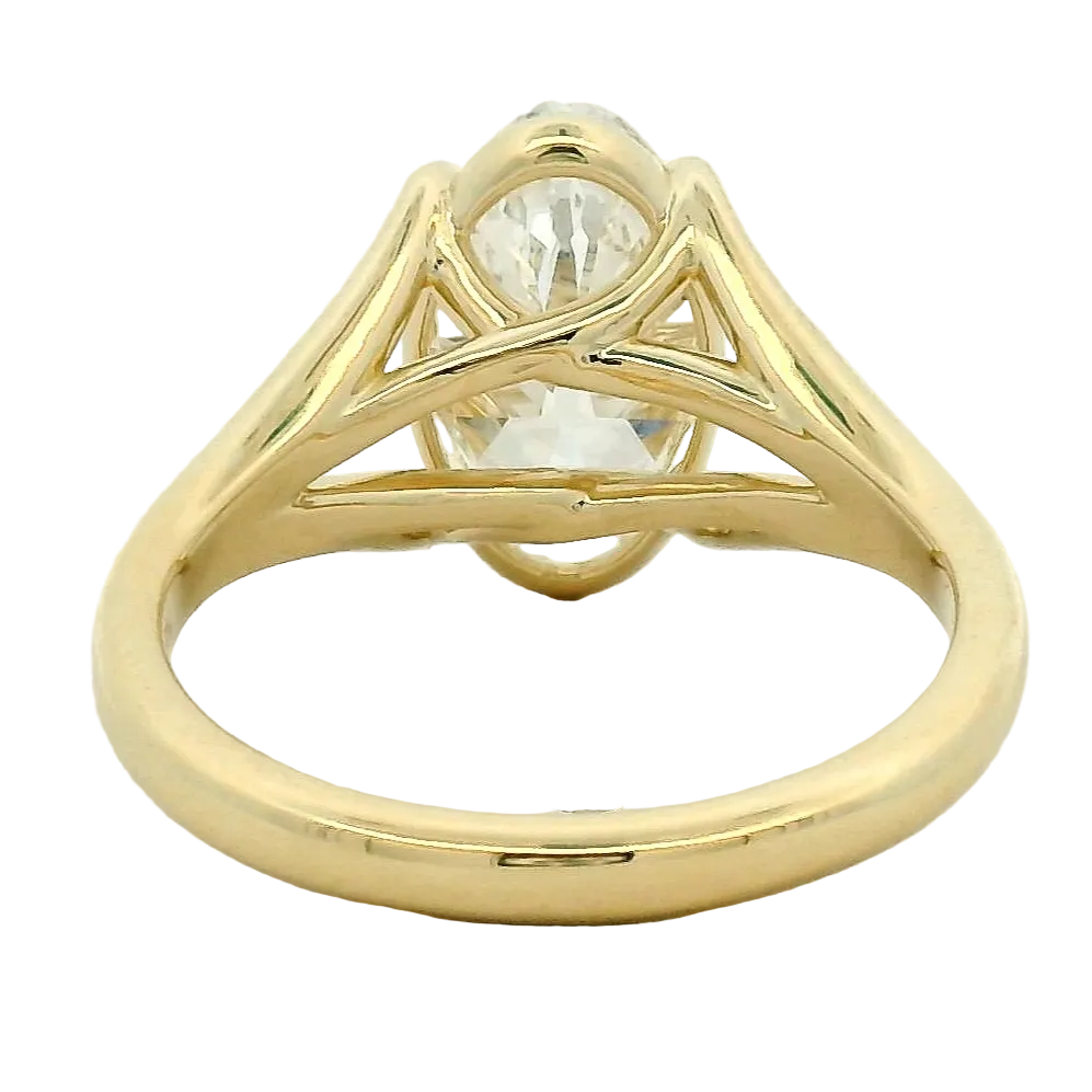Marquise Diamond Split Shank Solitaire Ring in Yellow Gold