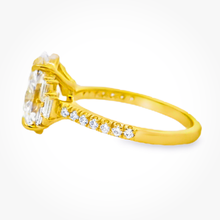 Yellow Gold Oval Diamond Ring with Stepped Baguette Accents