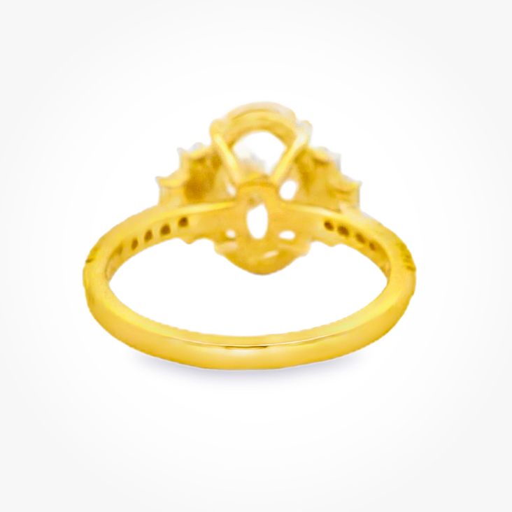 Yellow Gold Oval Diamond Ring with Stepped Baguette Accents